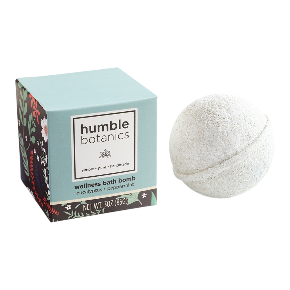 Humble Botanics wellness bath bomb with packaging on a white background