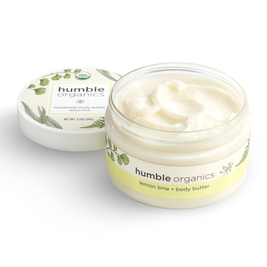 Jar of 'humble organics' lemon lime body butter on a white background