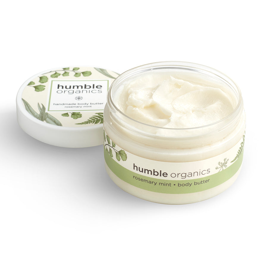 Humble Organics body butter jar with lid on a white background