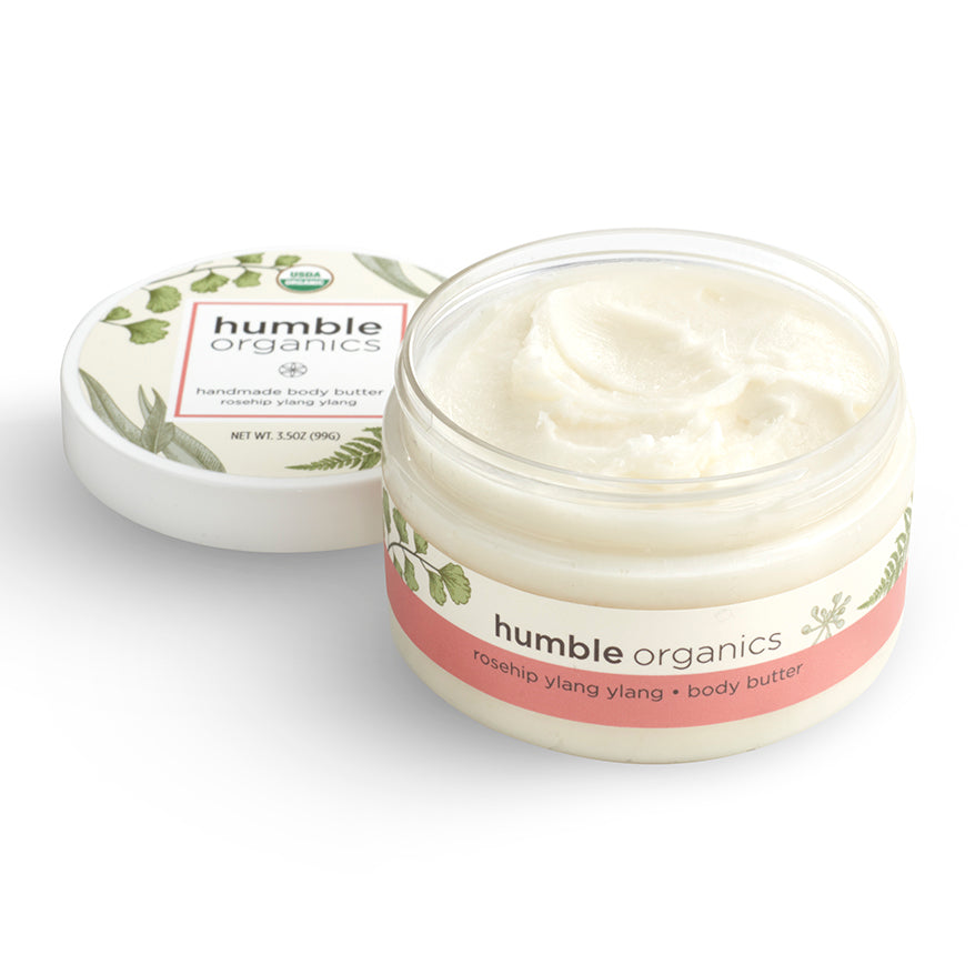 Jar of 'humble organics' body butter on a white background
