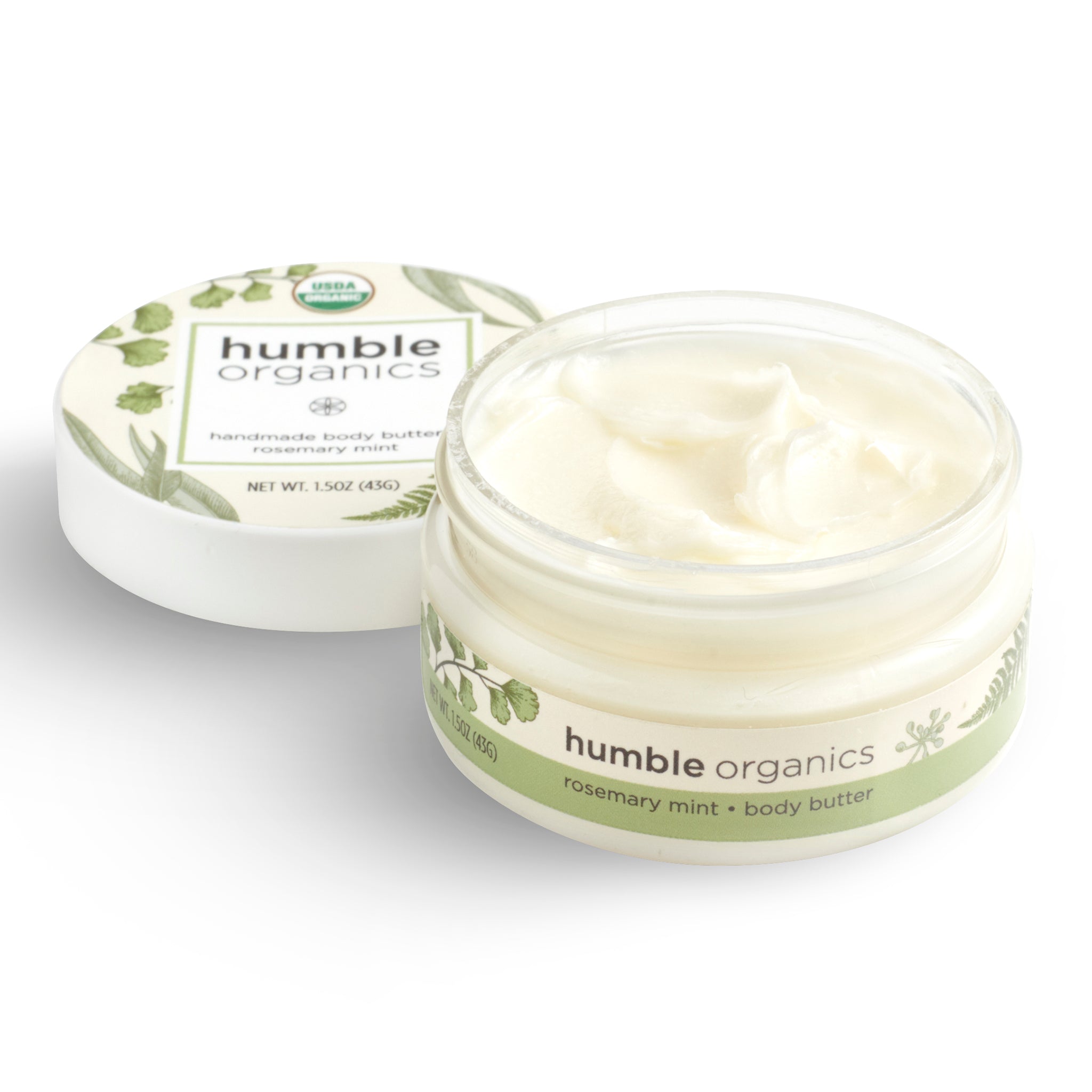 Humble Organics body butter jar with lid on a white background
