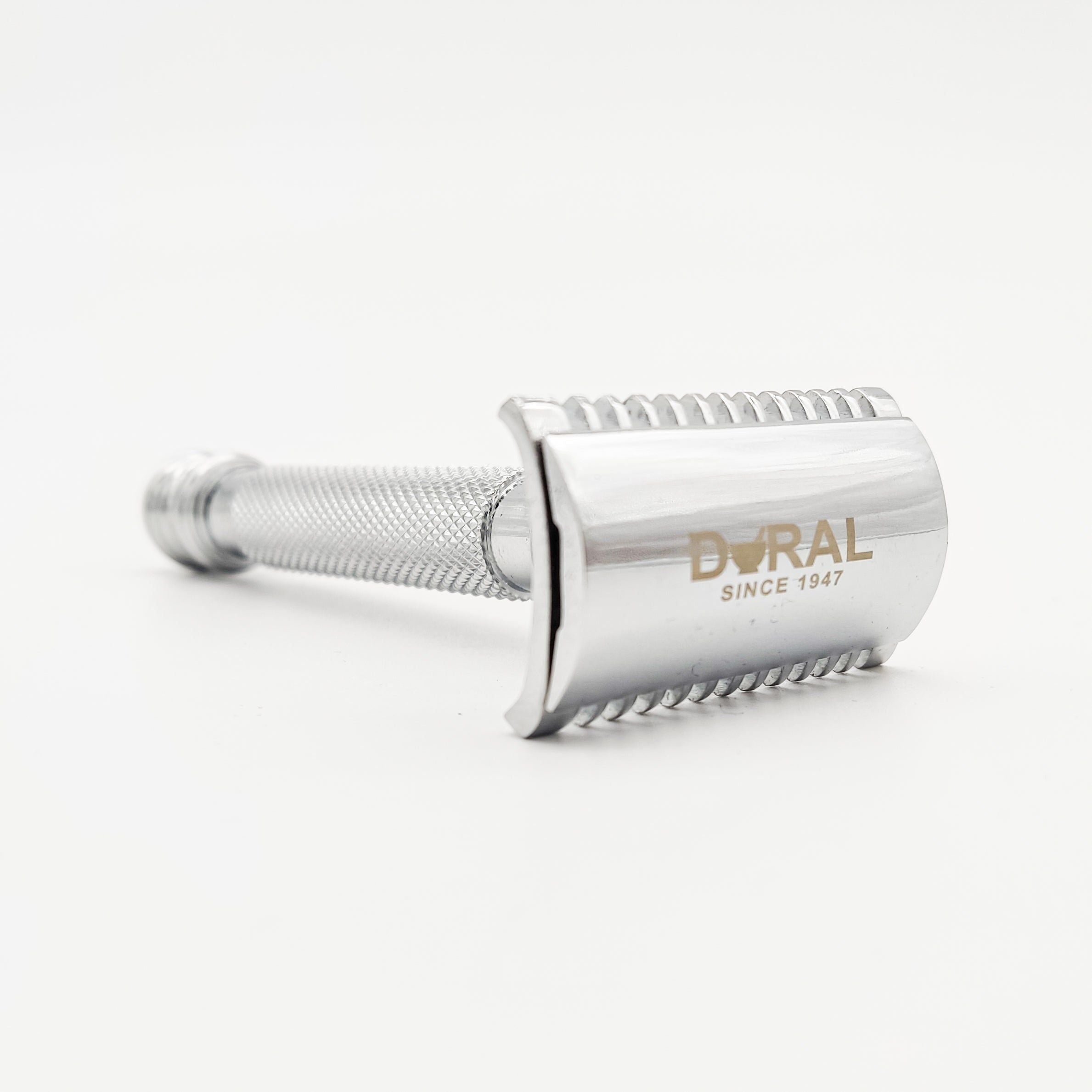 Silver Dural razor on a white background
