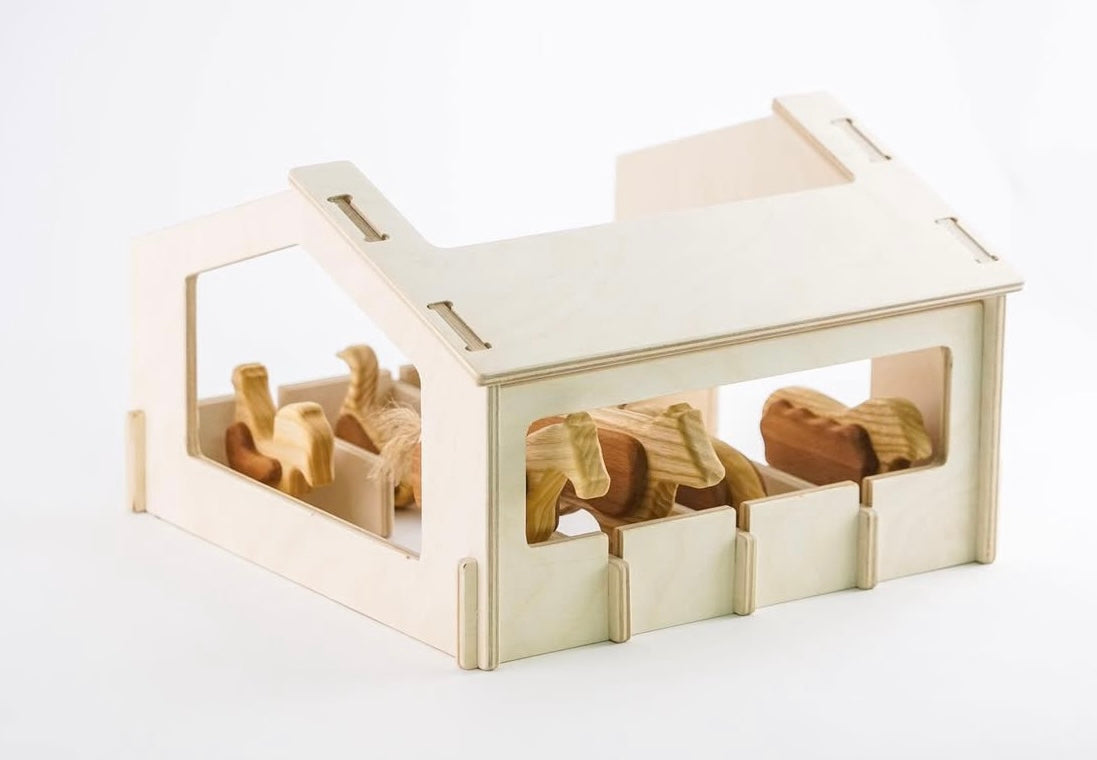 Wooden toy set with animals on a white background