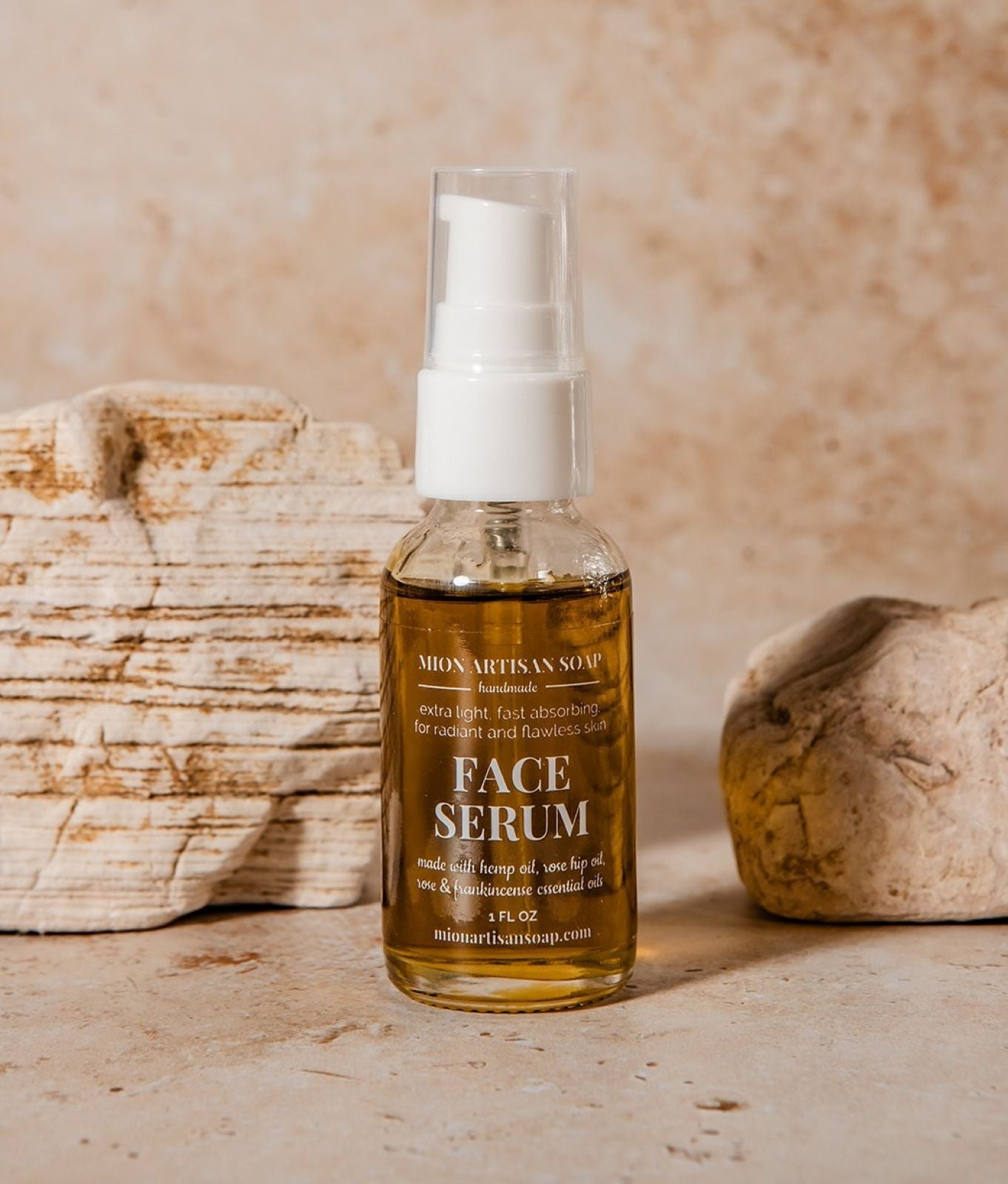 Bottle of face serum with a beige background