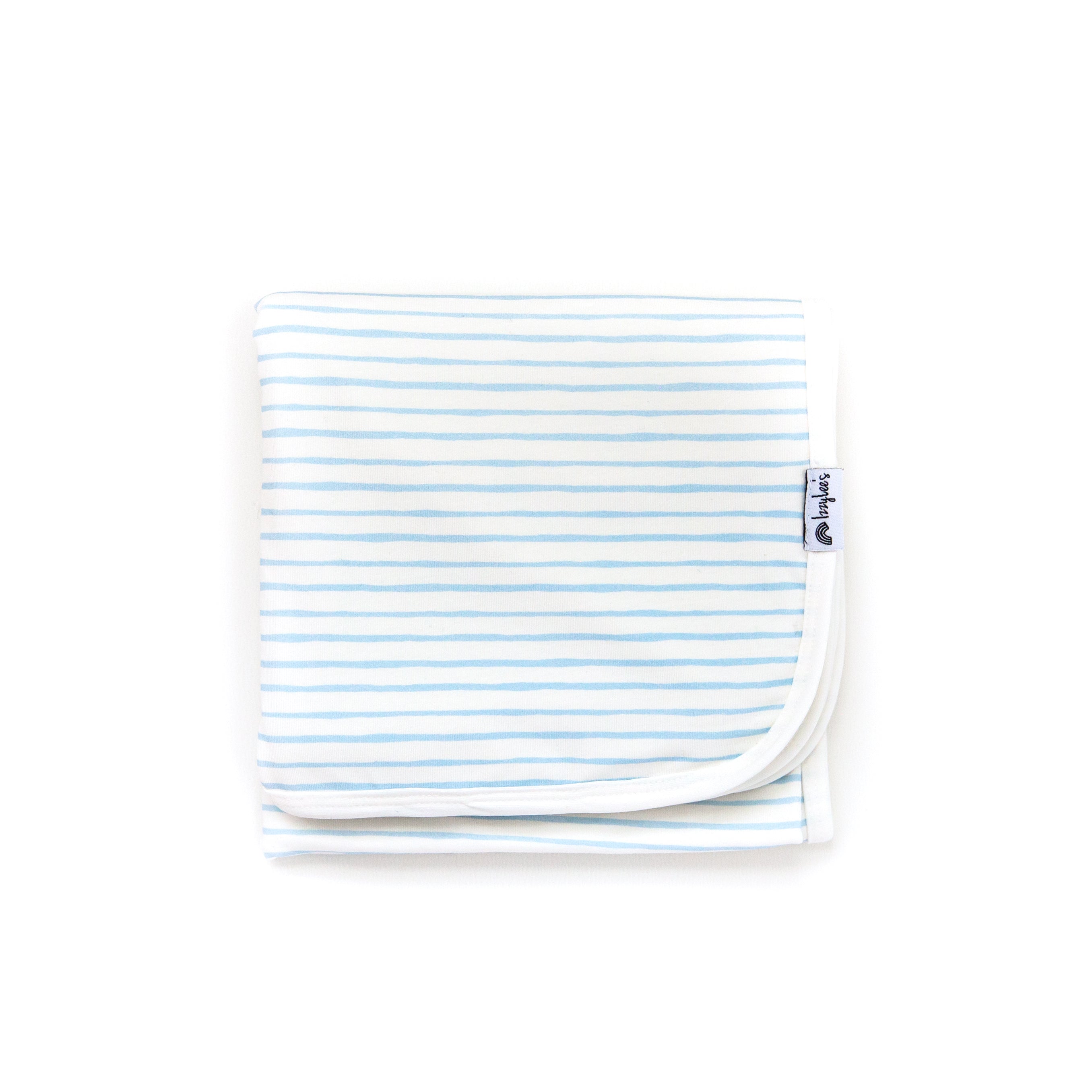 Folded baby blanket with blue stripes on a white background