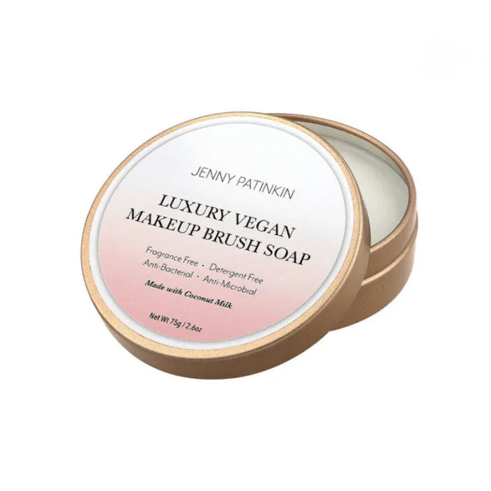 Jenny Patinkin Luxury Vegan Makeup Brush Soap in a round container on a white background