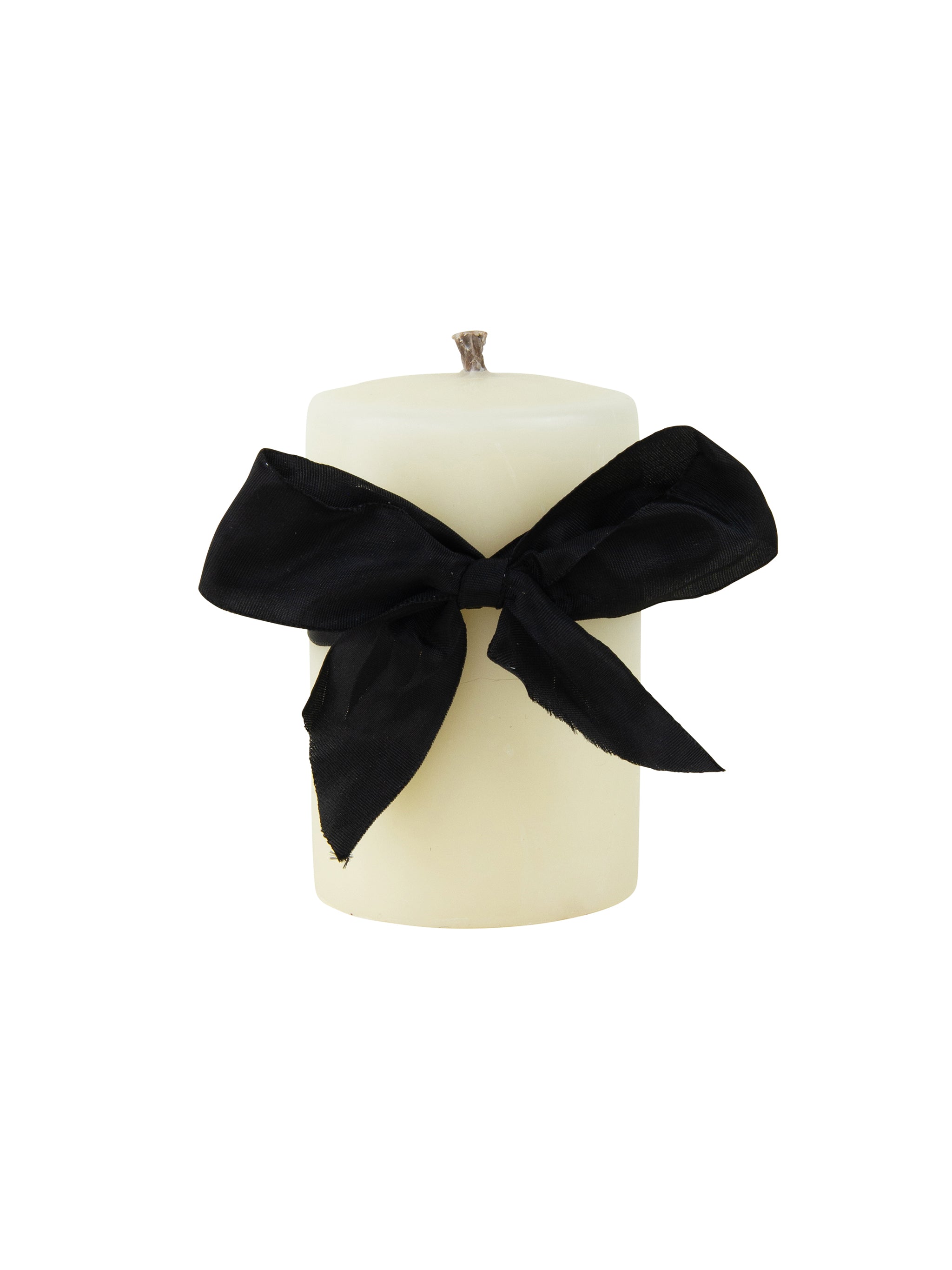 White candle with a black ribbon on a white background