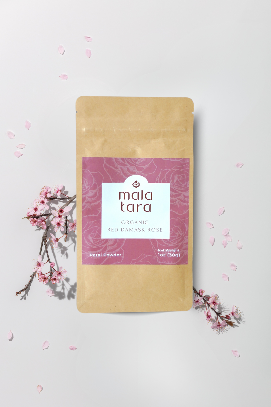 Mala Tara organic red damask rose packet on a light background with floral elements