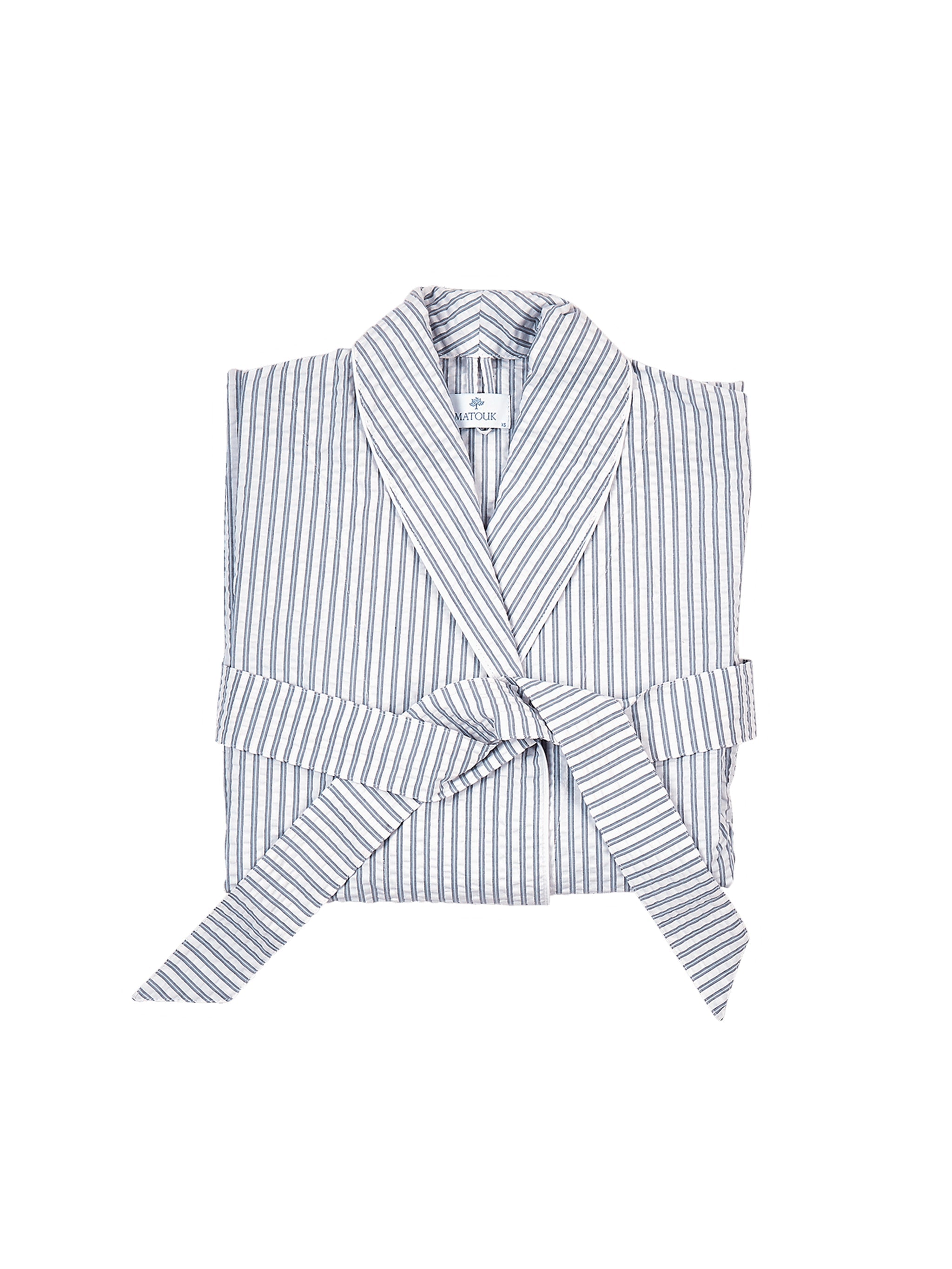 Blue and white striped robe on a white background