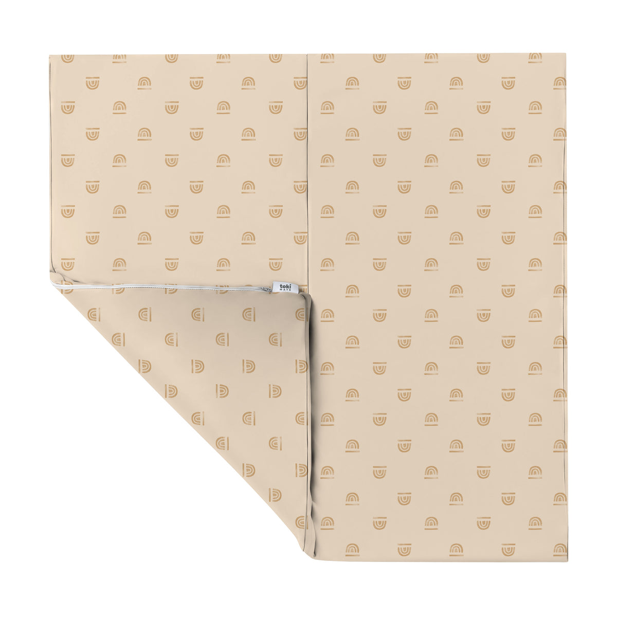 Cream-colored vegan leather play mat with soft rainbow accents
