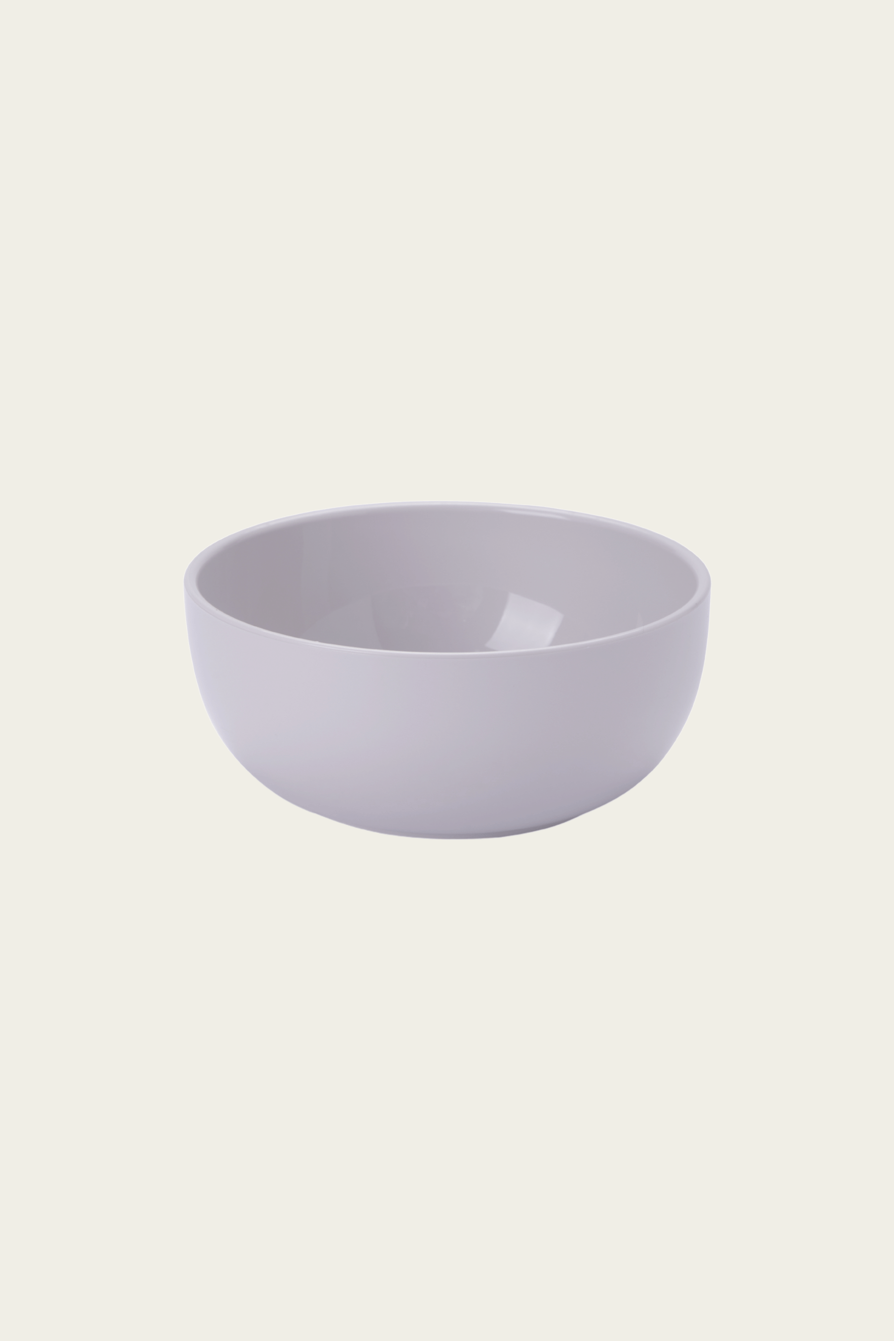 Light purple ceramic bowl on a light beige background