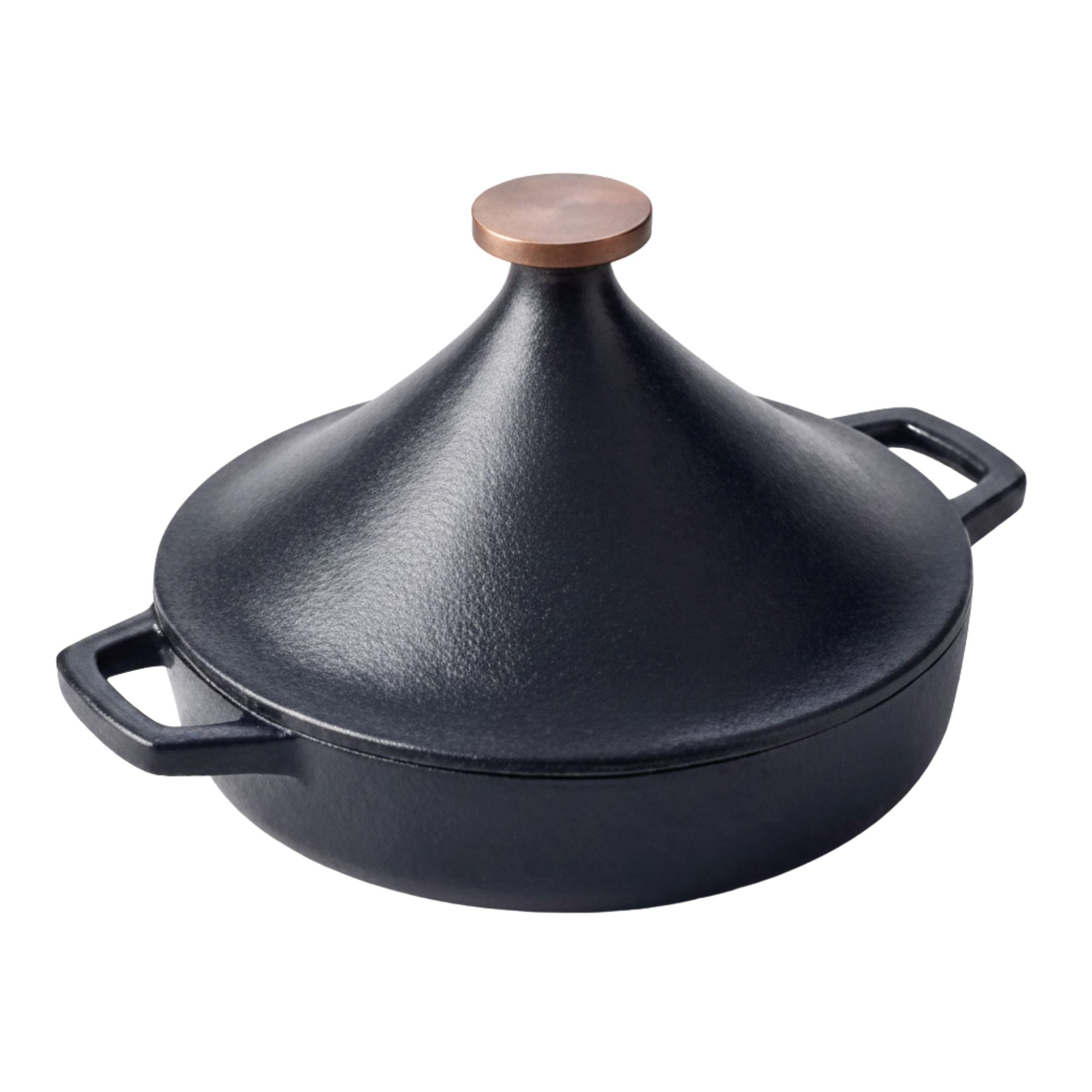 Black cast iron tagine pot with a copper lid on a white background