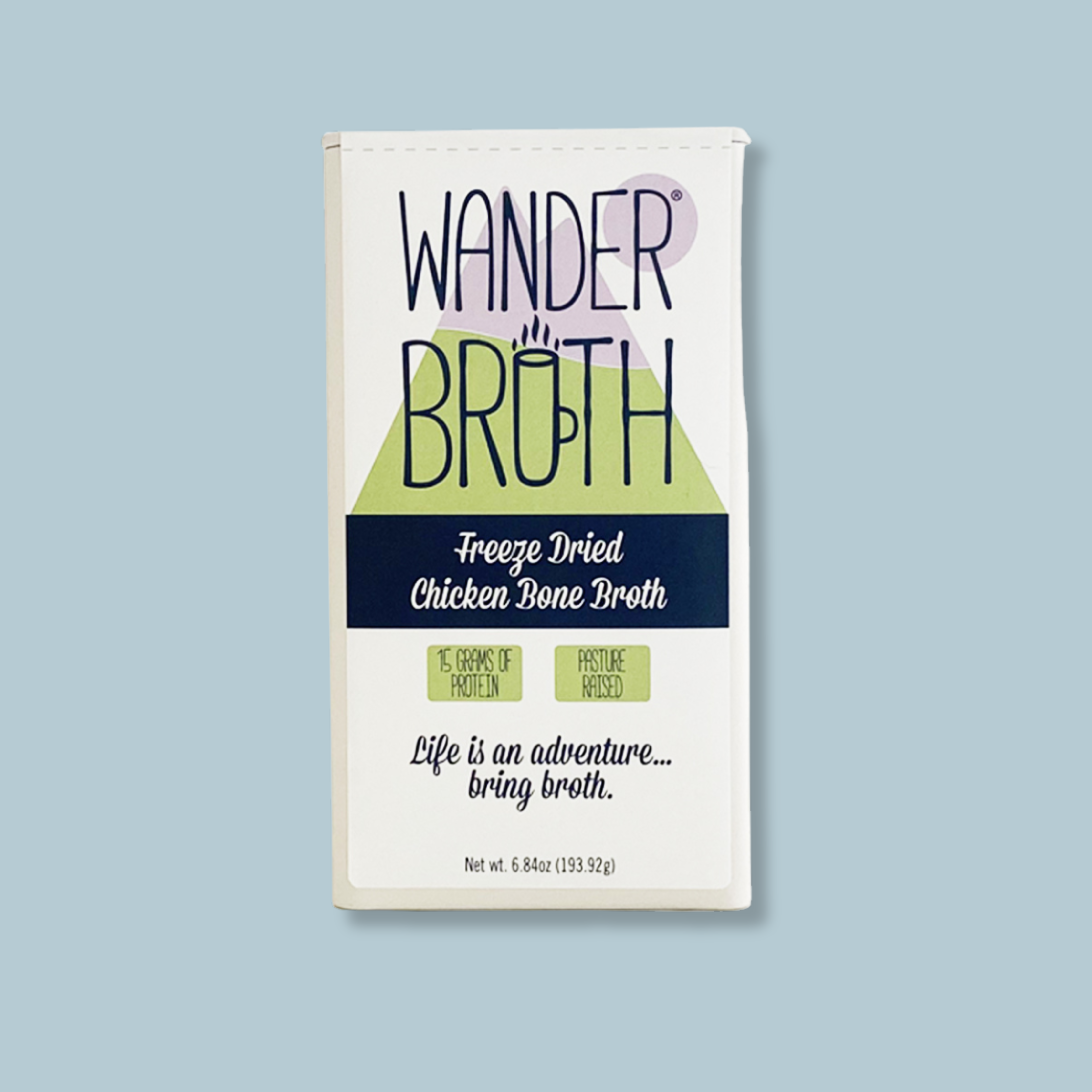 A package of Wander Breath Freeze Dried Chicken Bone Broth, featuring a white package with navy blue and light green graphic accents, set against a solid light blue background.