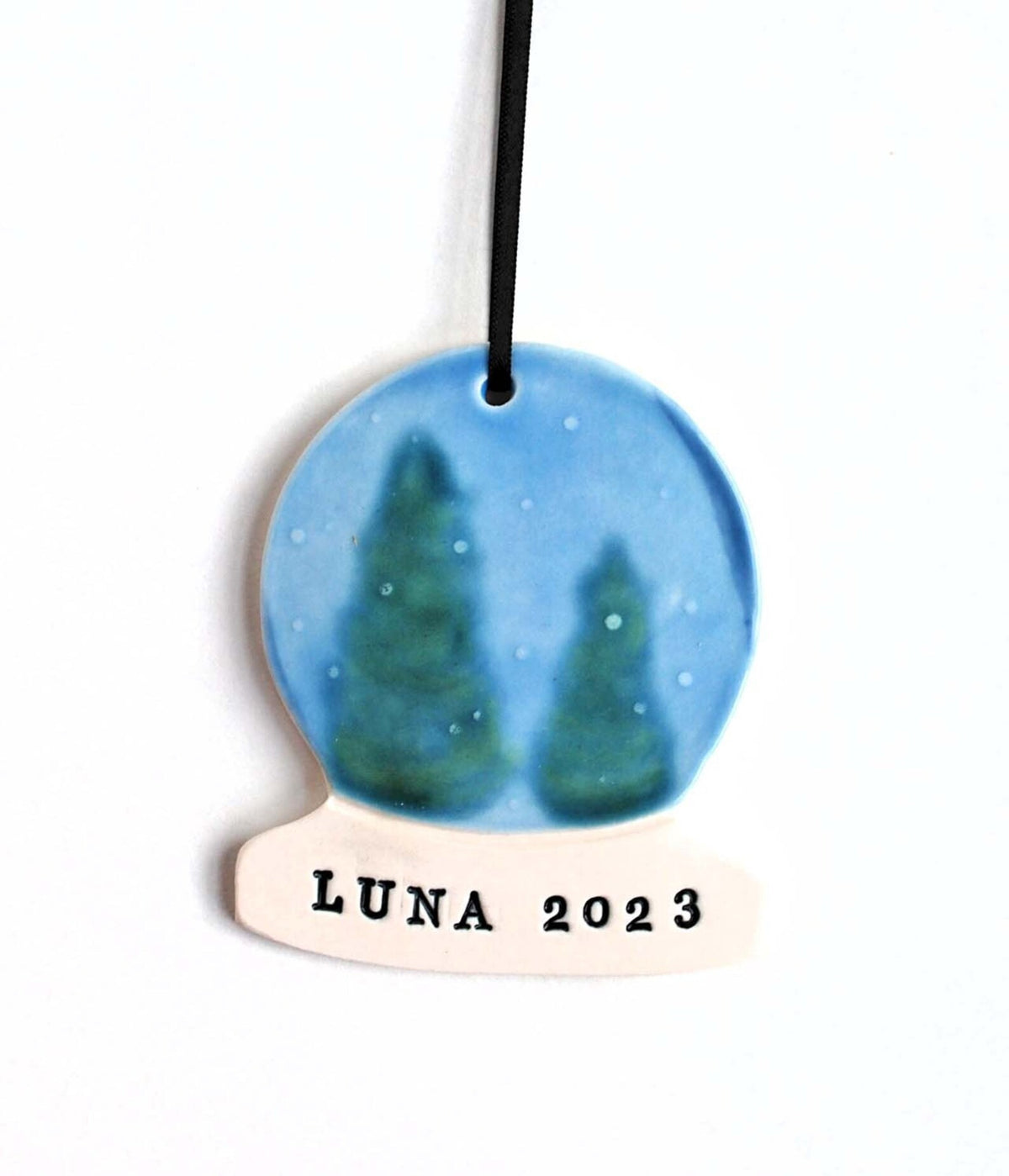 36. Personalized Snow Globe Ornament