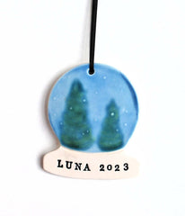 36. Personalized Snow Globe Ornament