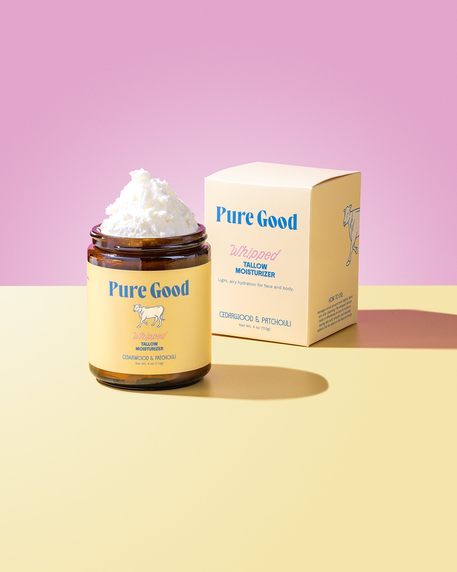 Jar of whipped cream with 'Pure Good' branding on a pink and yellow gradient background
