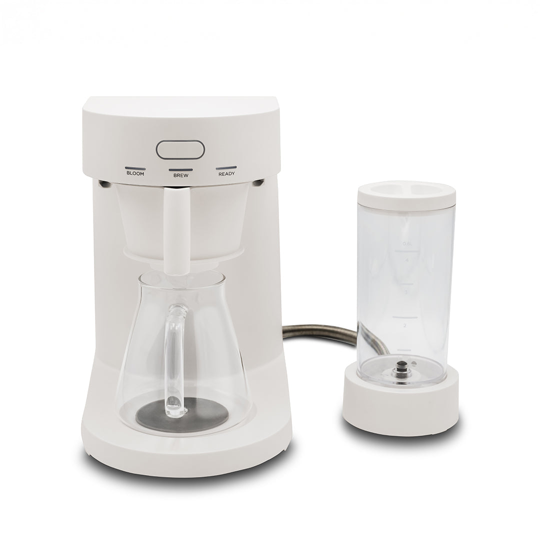 White coffee maker with clear carafe on a white background