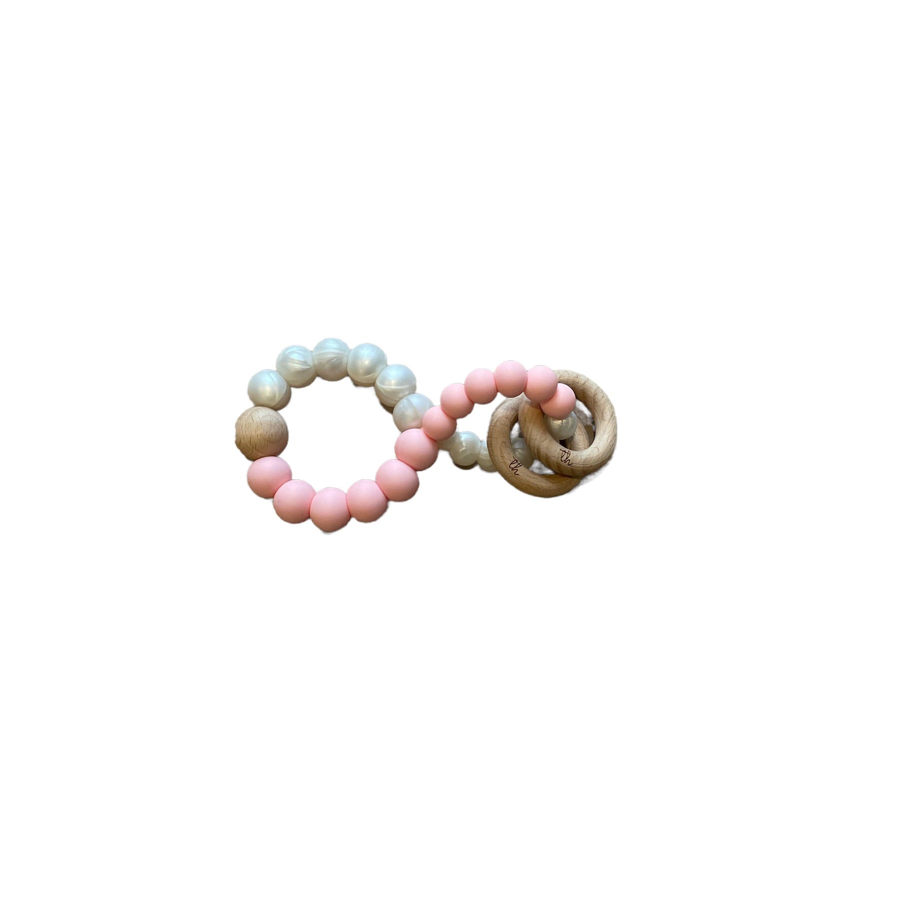 Set of two baby teething rings with pastel beads on a white background