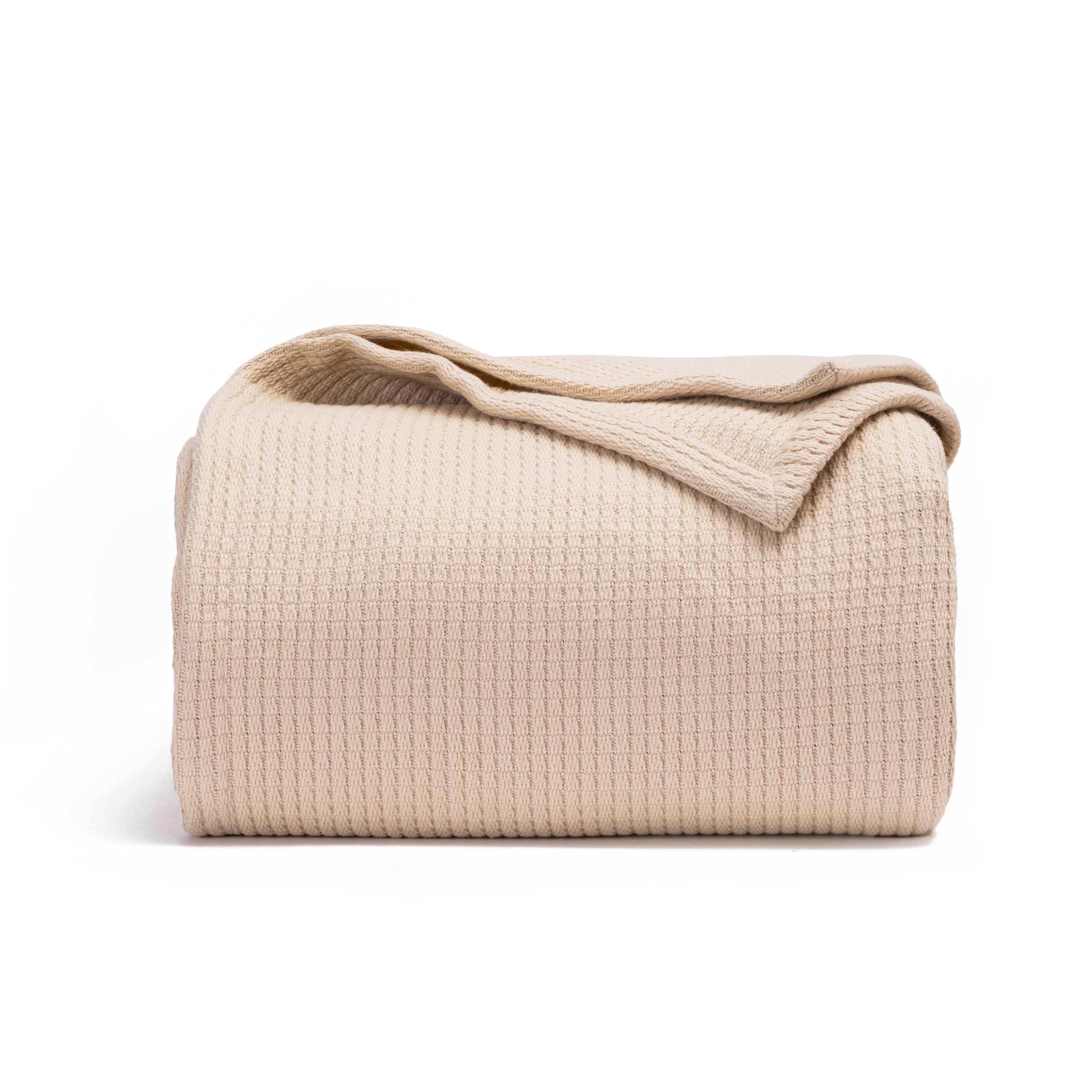 Beige woven blanket on a white background