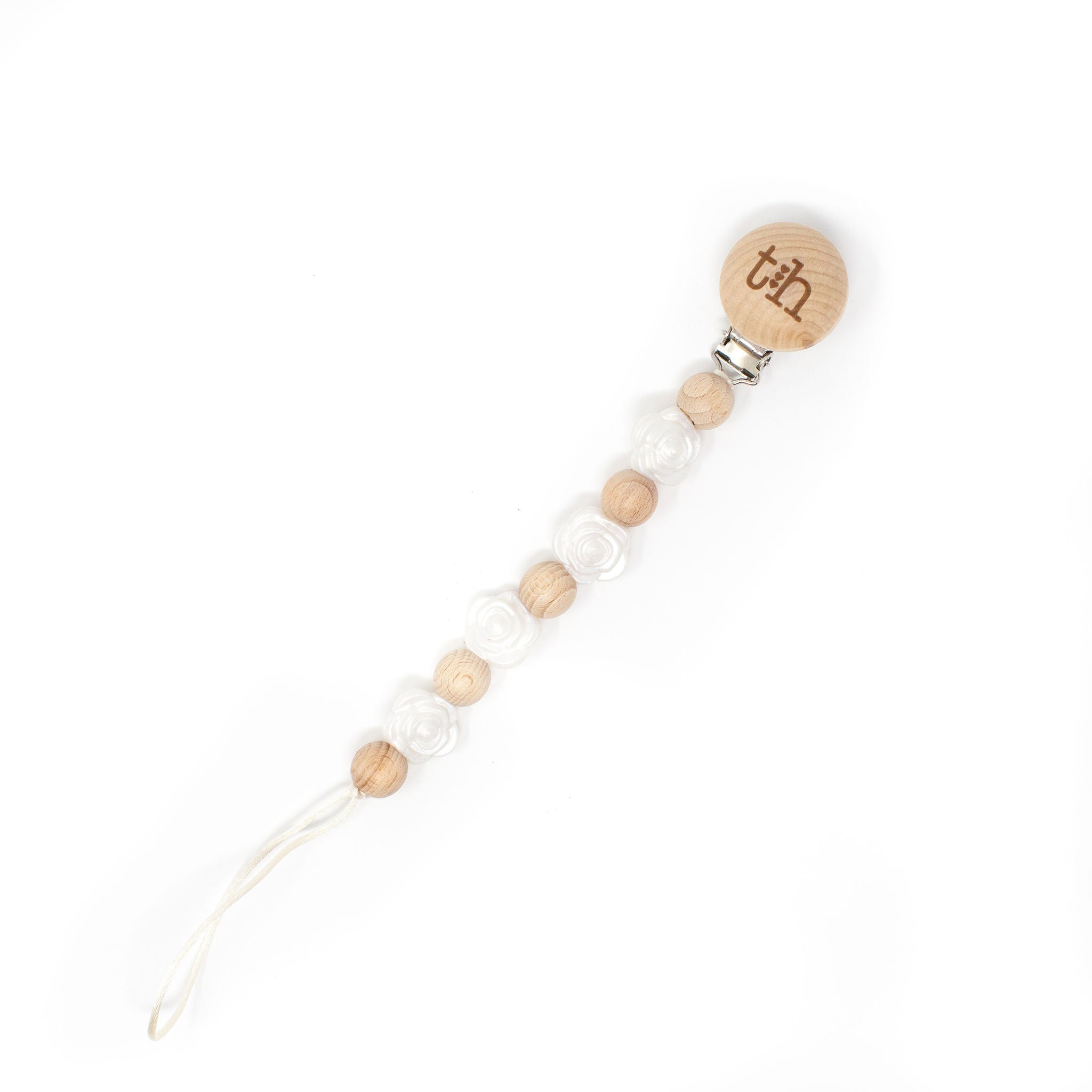 Wooden pacifier clip with beads on a white background