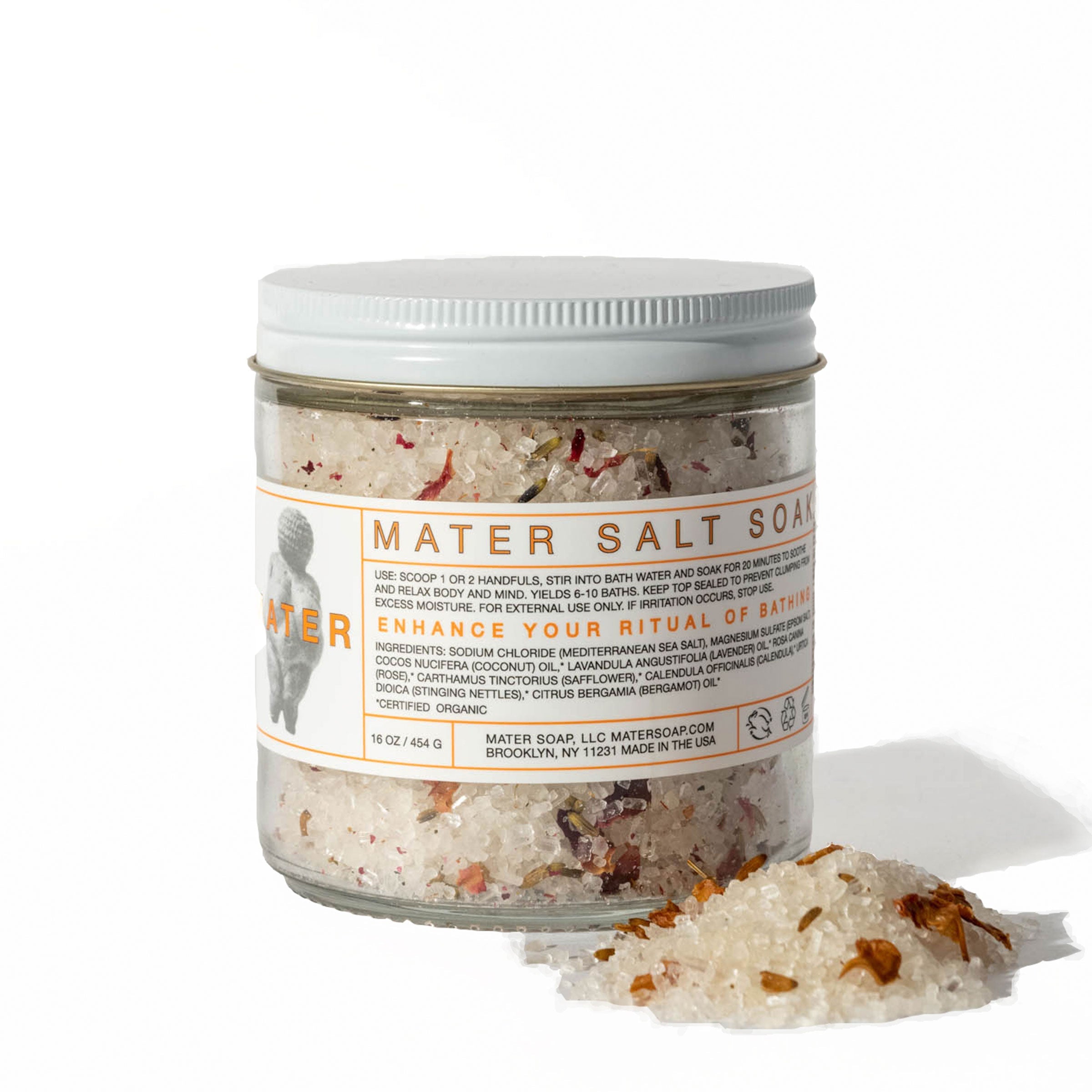 Jar of Mater Salt Soap with a white lid on a white background