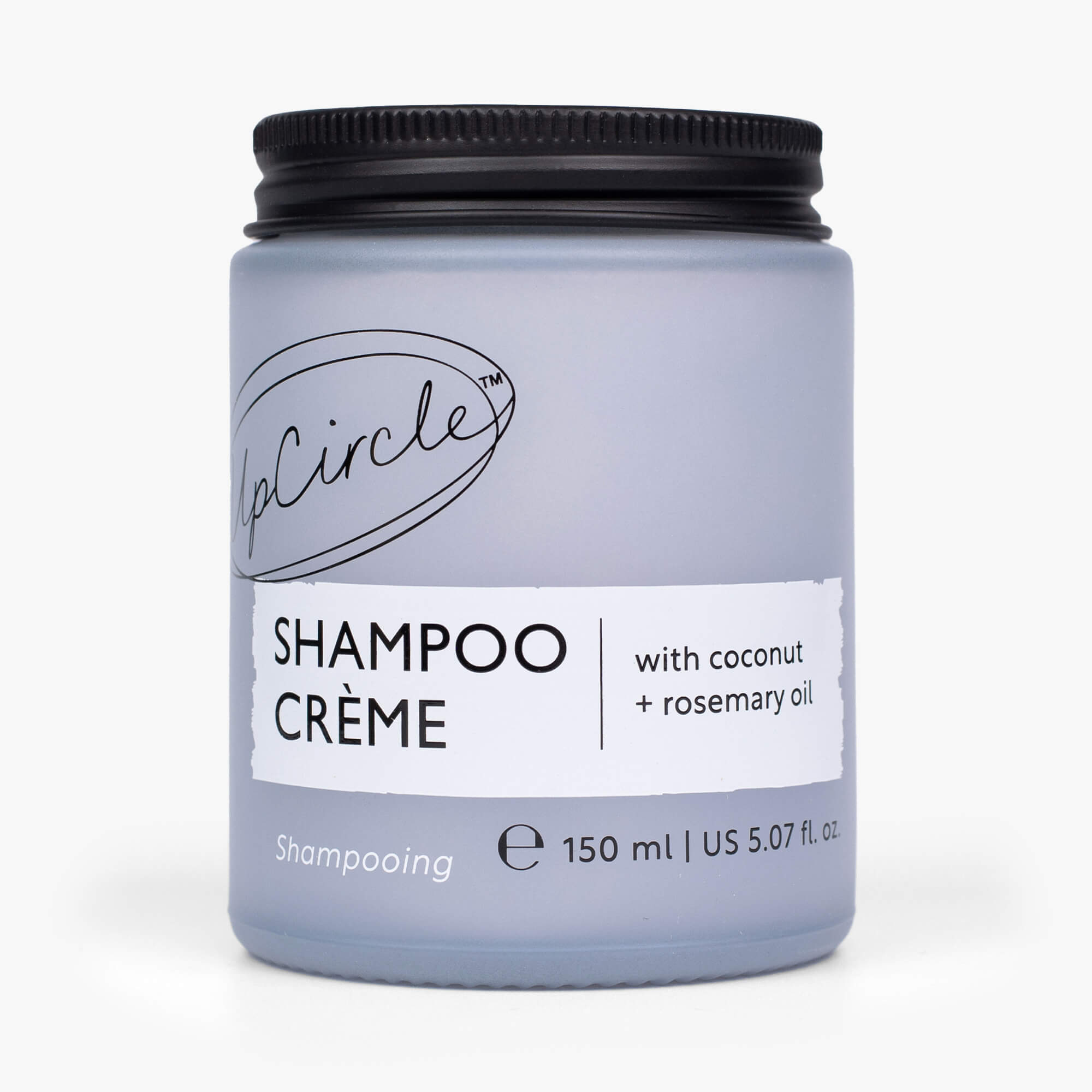 Shampoo crème jar with black lid on a white background