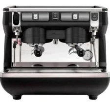 Commercial espresso machine with two groups on a black background