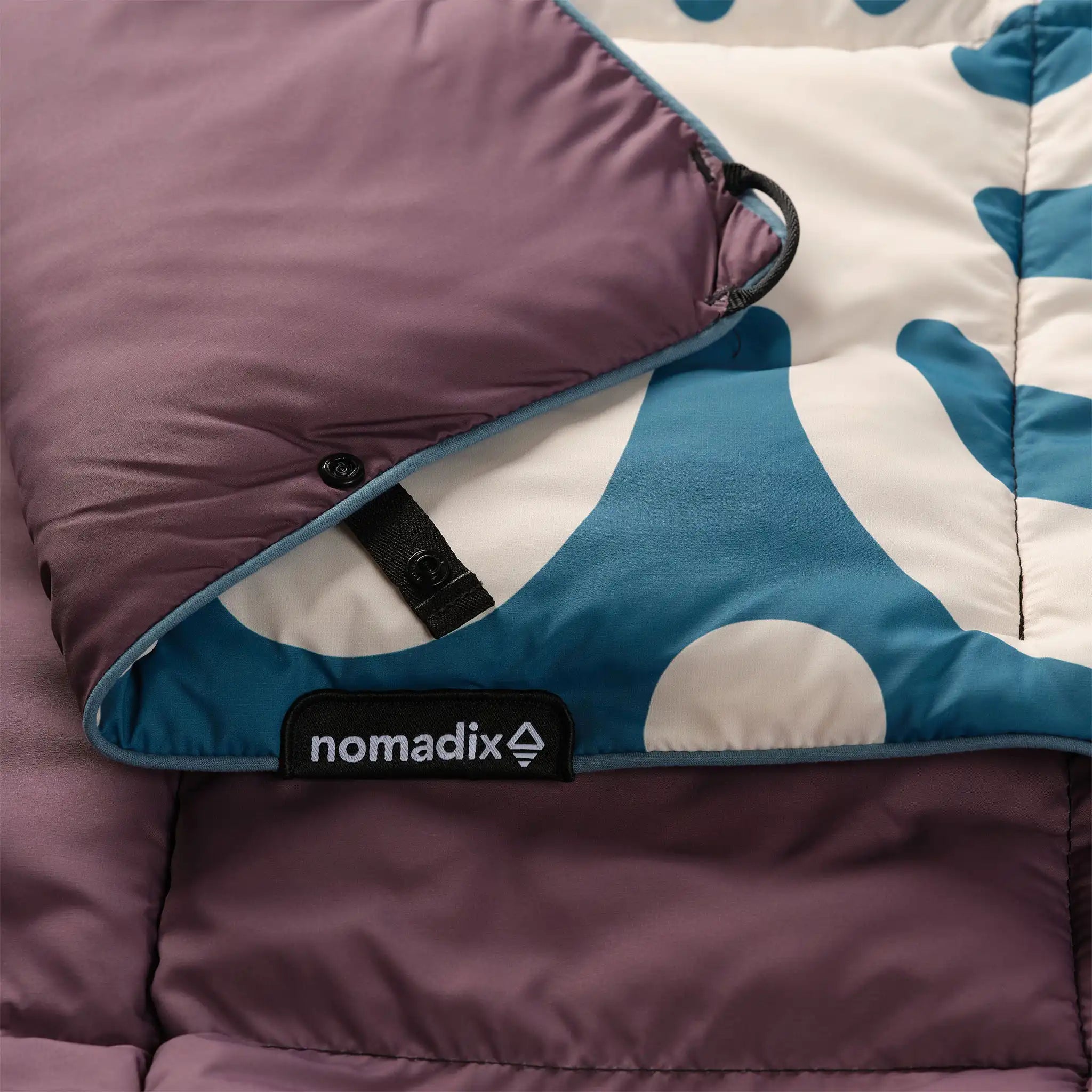 Nomadix Graphene Puffer Blanket: Whirlpool Teal Ocean