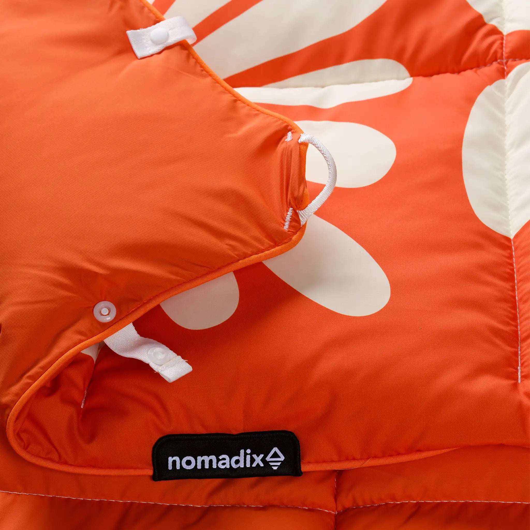 Nomadix Graphene Puffer Blanket: Big Flowers Expedition Orange