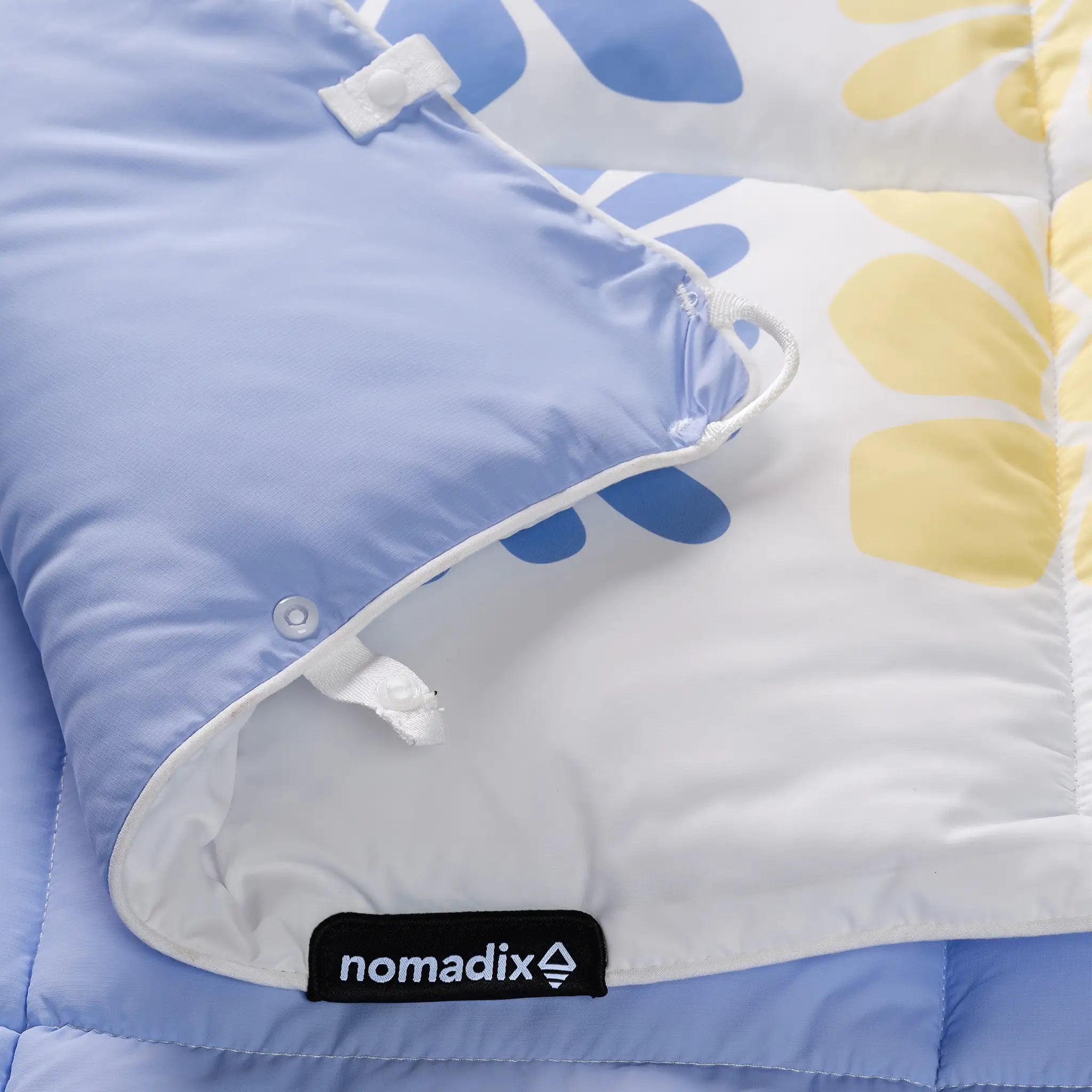 Nomadix Graphene Puffer Blanket: Flowerbed Multi