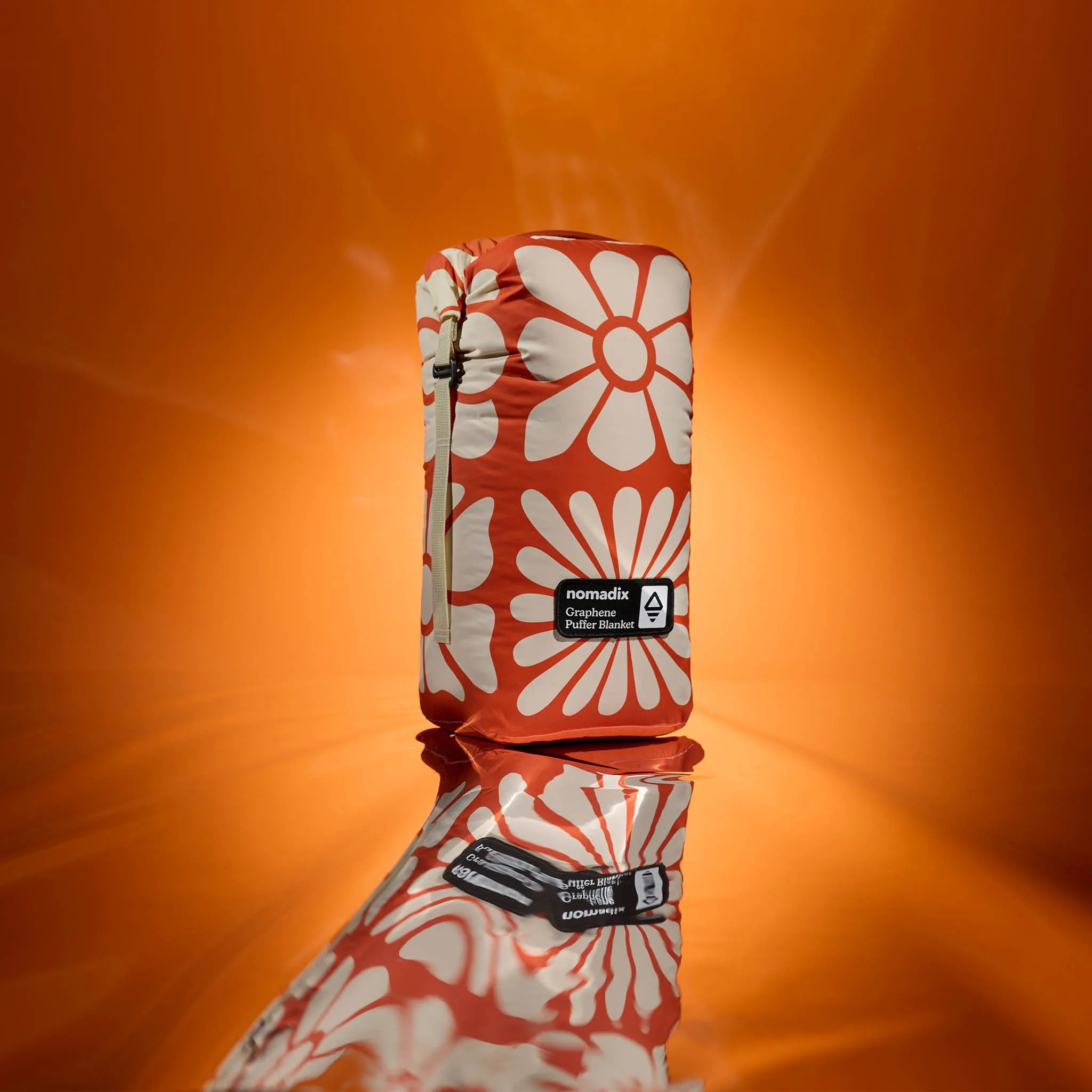 Nomadix Graphene Puffer Blanket: Big Flowers Expedition Orange