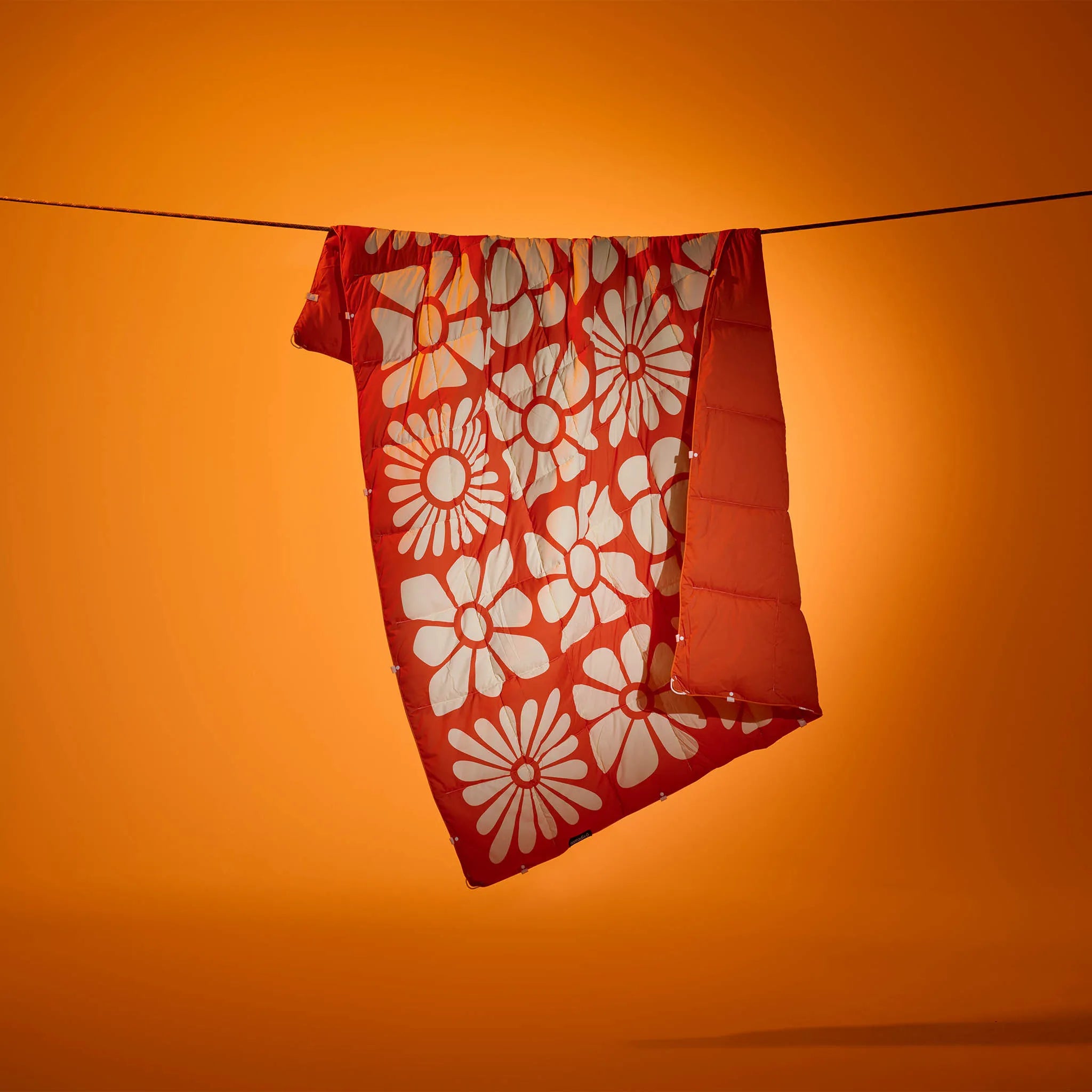 Nomadix Graphene Puffer Blanket: Big Flowers Expedition Orange