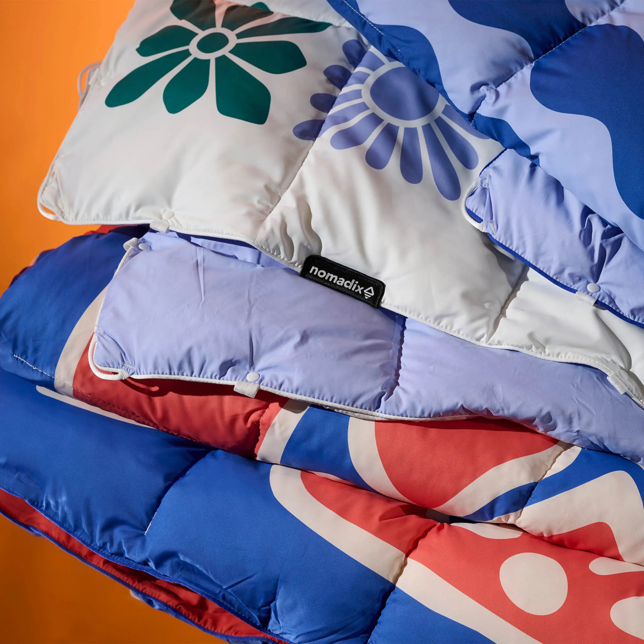 Nomadix Graphene Puffer Blanket: Flowerbed Multi