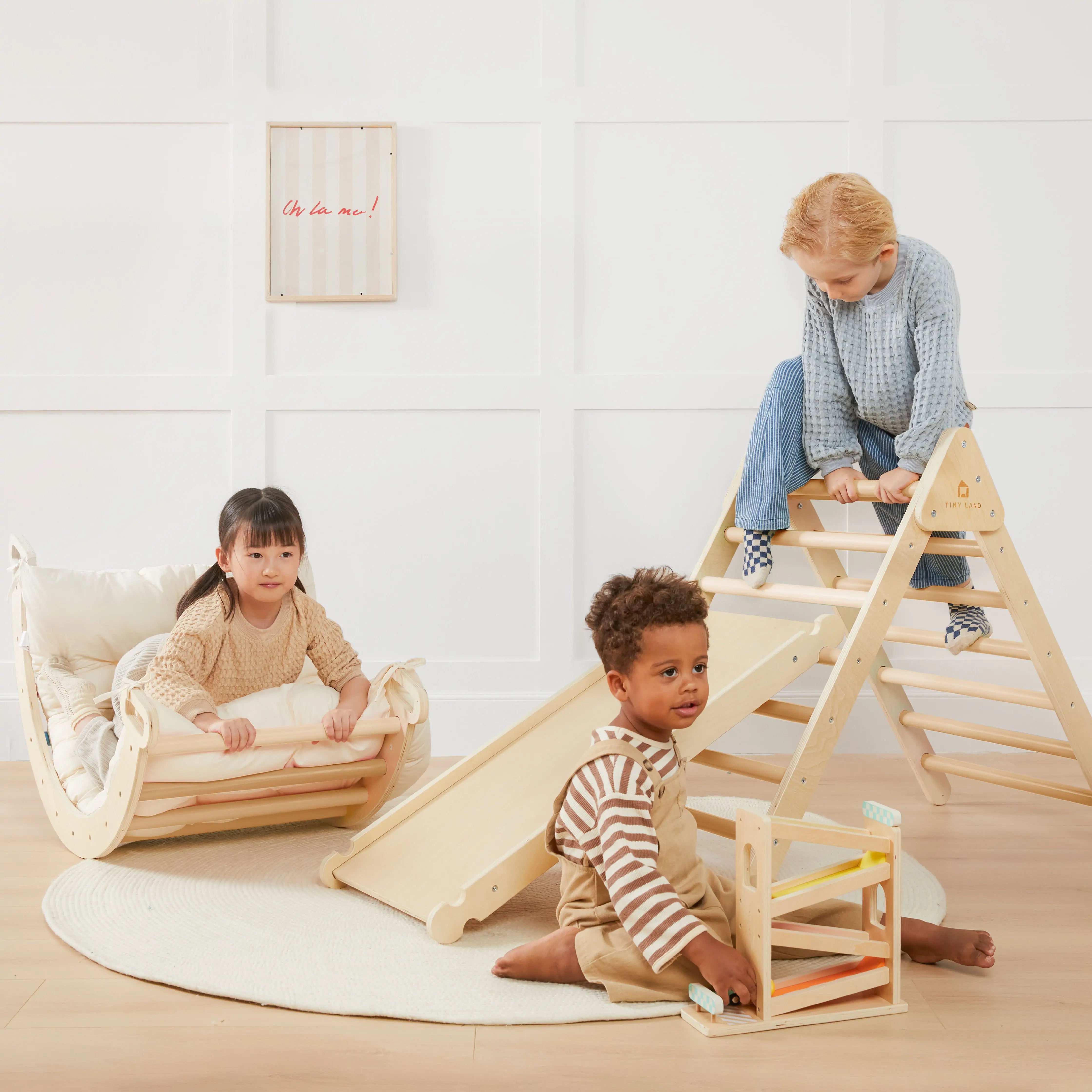 Children playing with wooden toys in a bright room