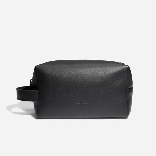 33. Water-Resistant Leather Grooming Bag