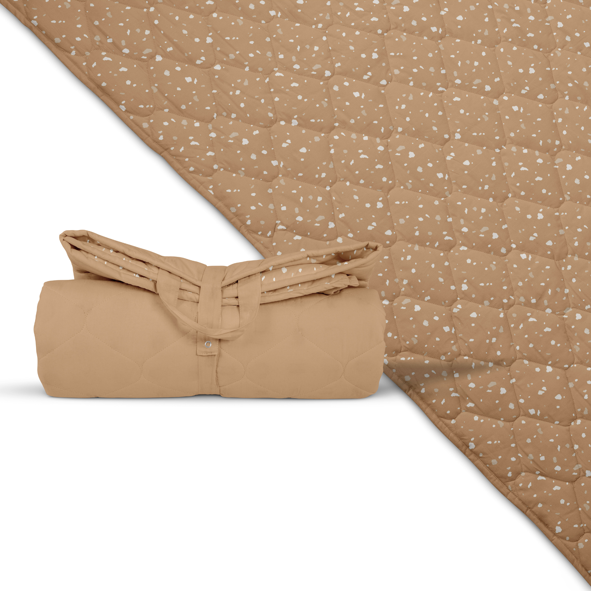Rolled-up beige blanket with a subtle pattern on a matching fabric background