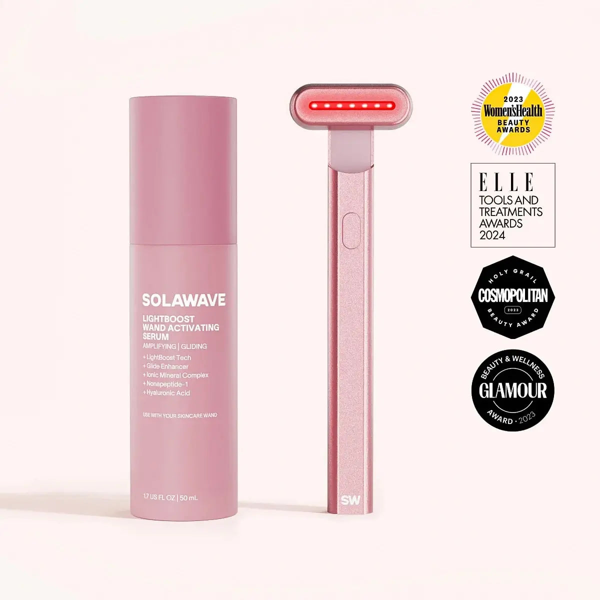 Pink skincare serum bottle and device with awards on a white background