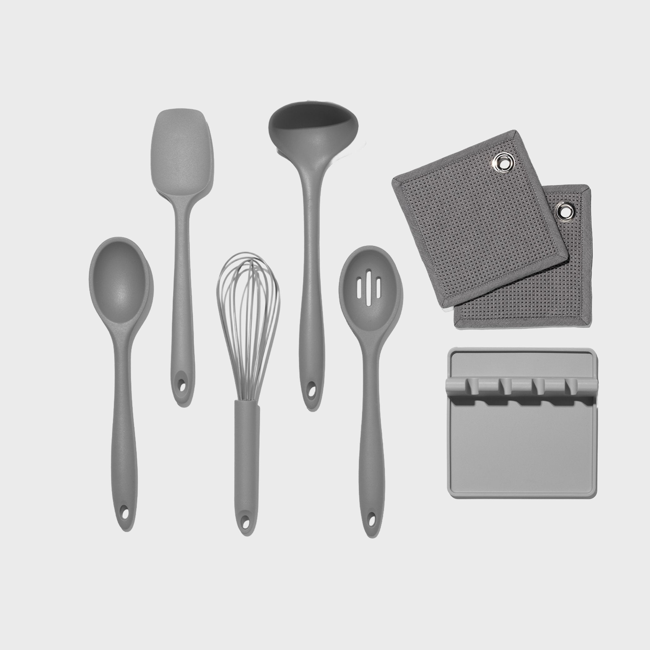 Set of gray kitchen utensils and tools on a light gray background