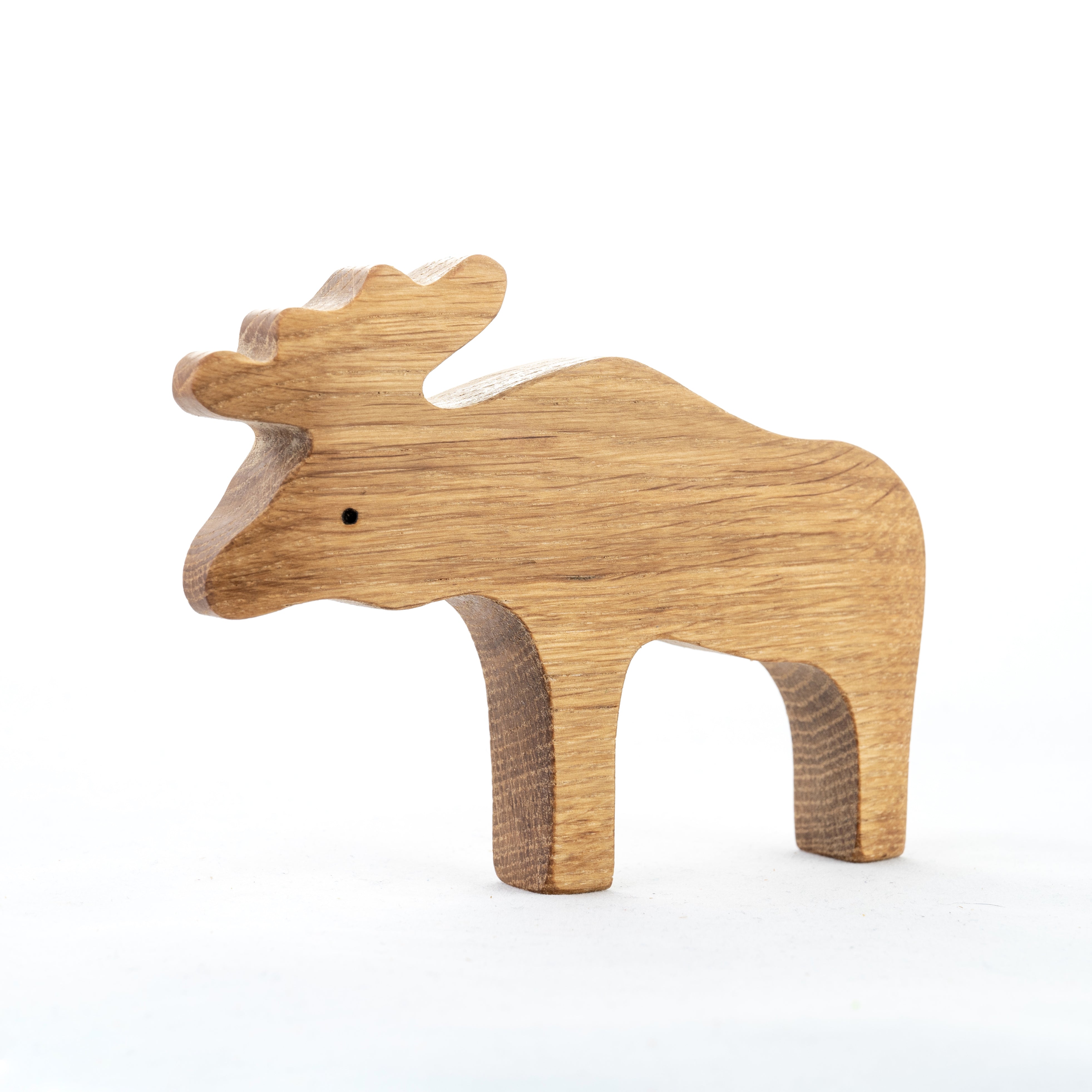 Wooden moose figurine on a white background
