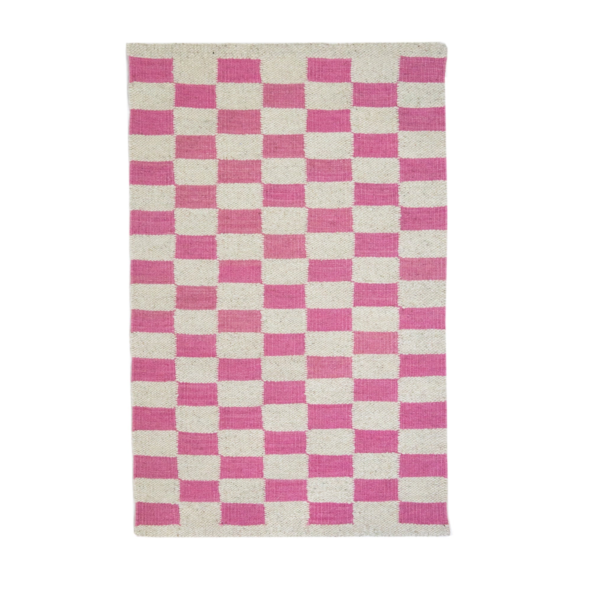 Checkered rug with pink and white squares on a white background
