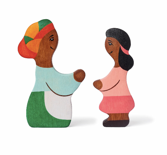 Two wooden figurines of a man and woman holding hands on a white background