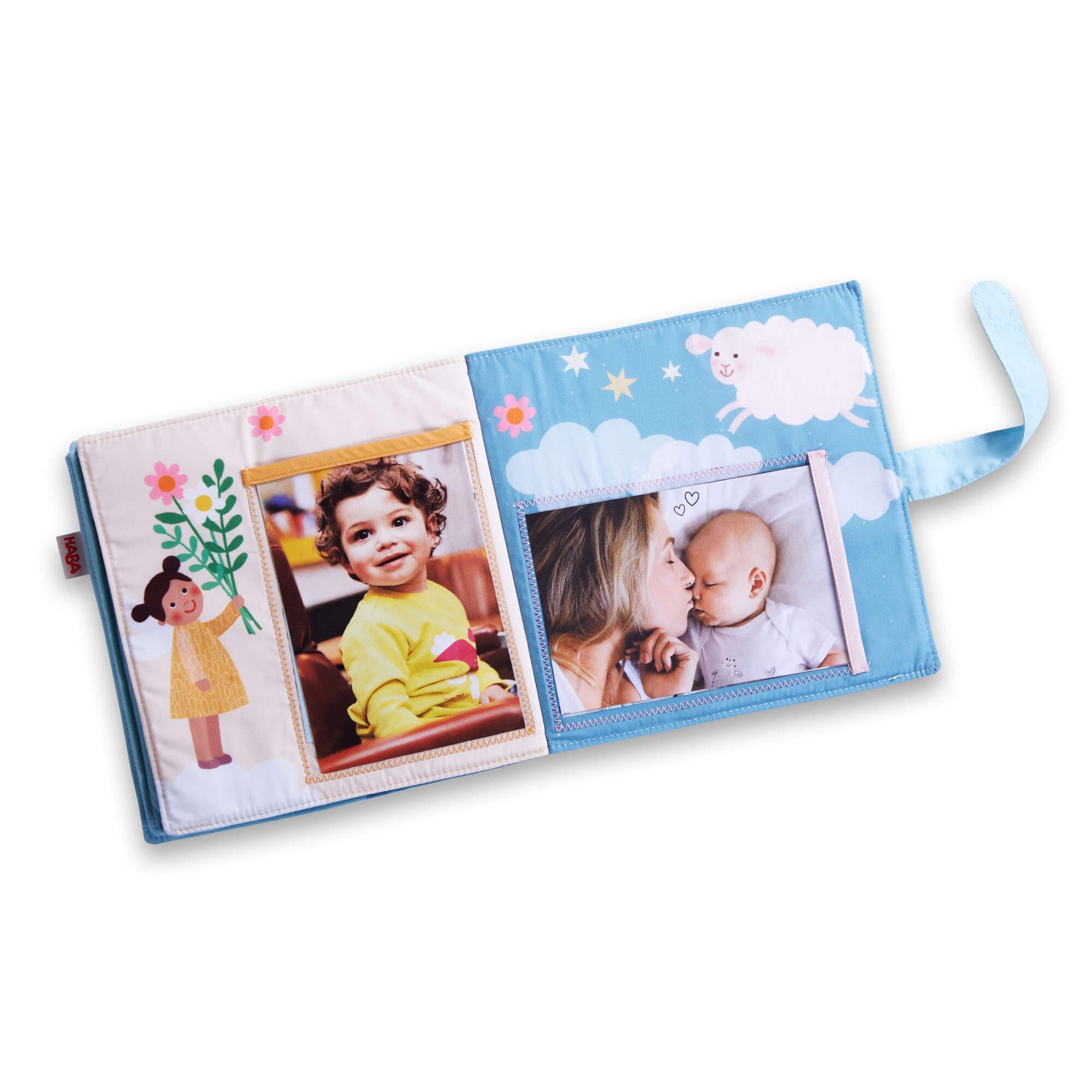 Children's photo album with images of a child and a baby on a white background