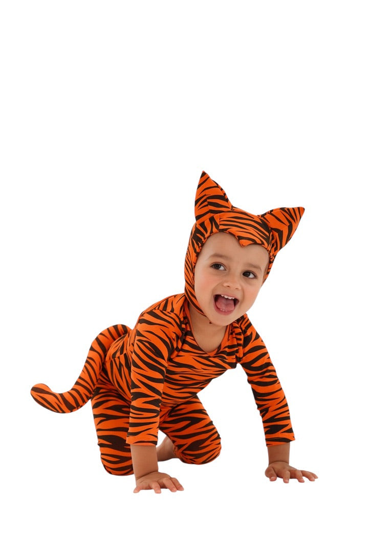 A baby wearing an orange and black tiger costume, crawling on a solid white background.