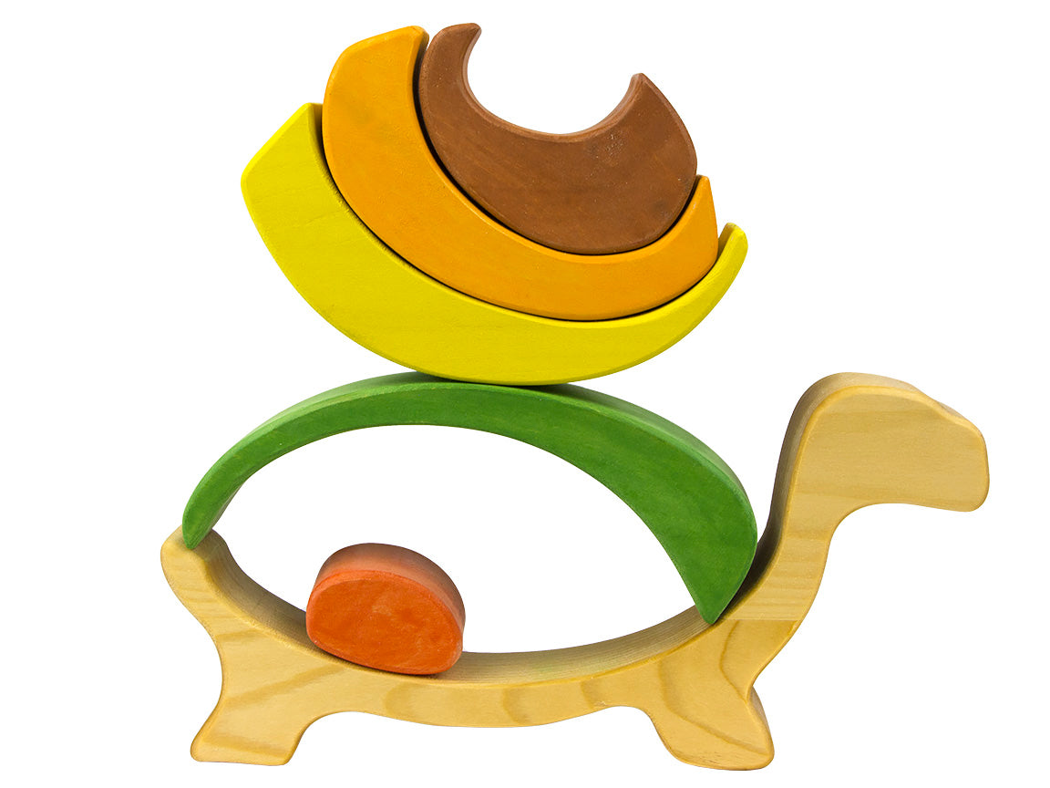 Wooden toy with colorful rings stacked on a base