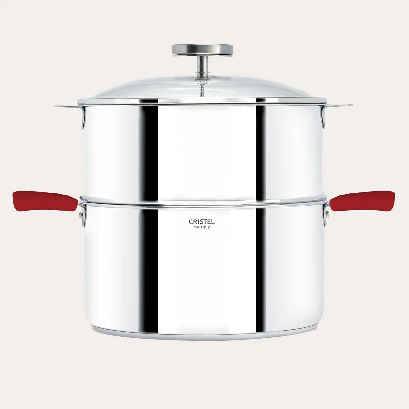 Stainless steel pot with red handles on a light beige background