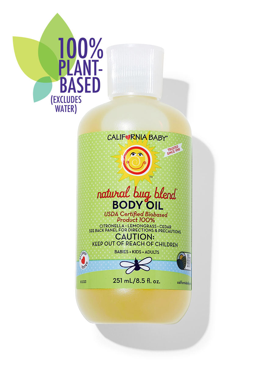 California Baby natural bug blend body oil bottle with green label on a white background