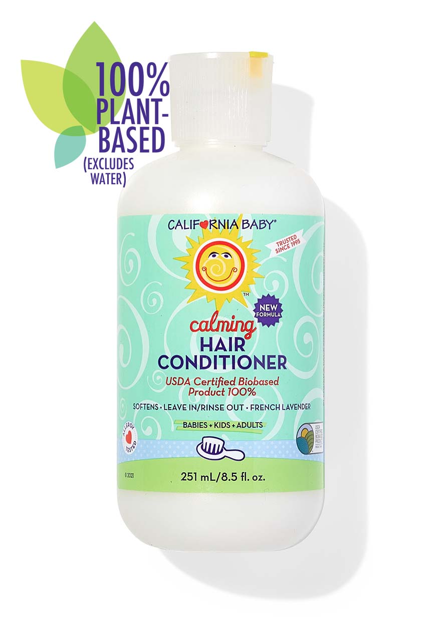 California Baby hair conditioner bottle with plant-based label on a white background
