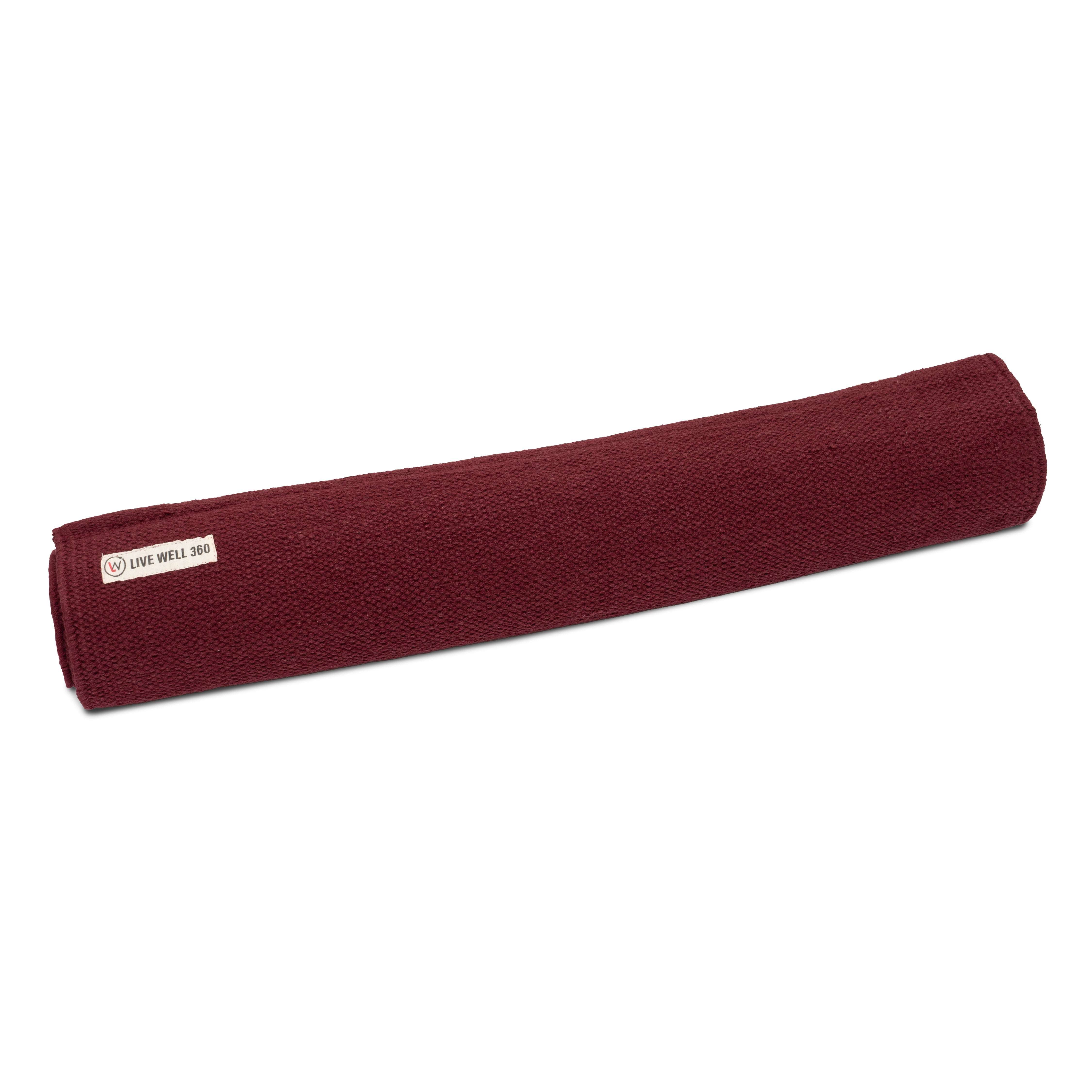 Maroon yoga mat with a brand label on a white background