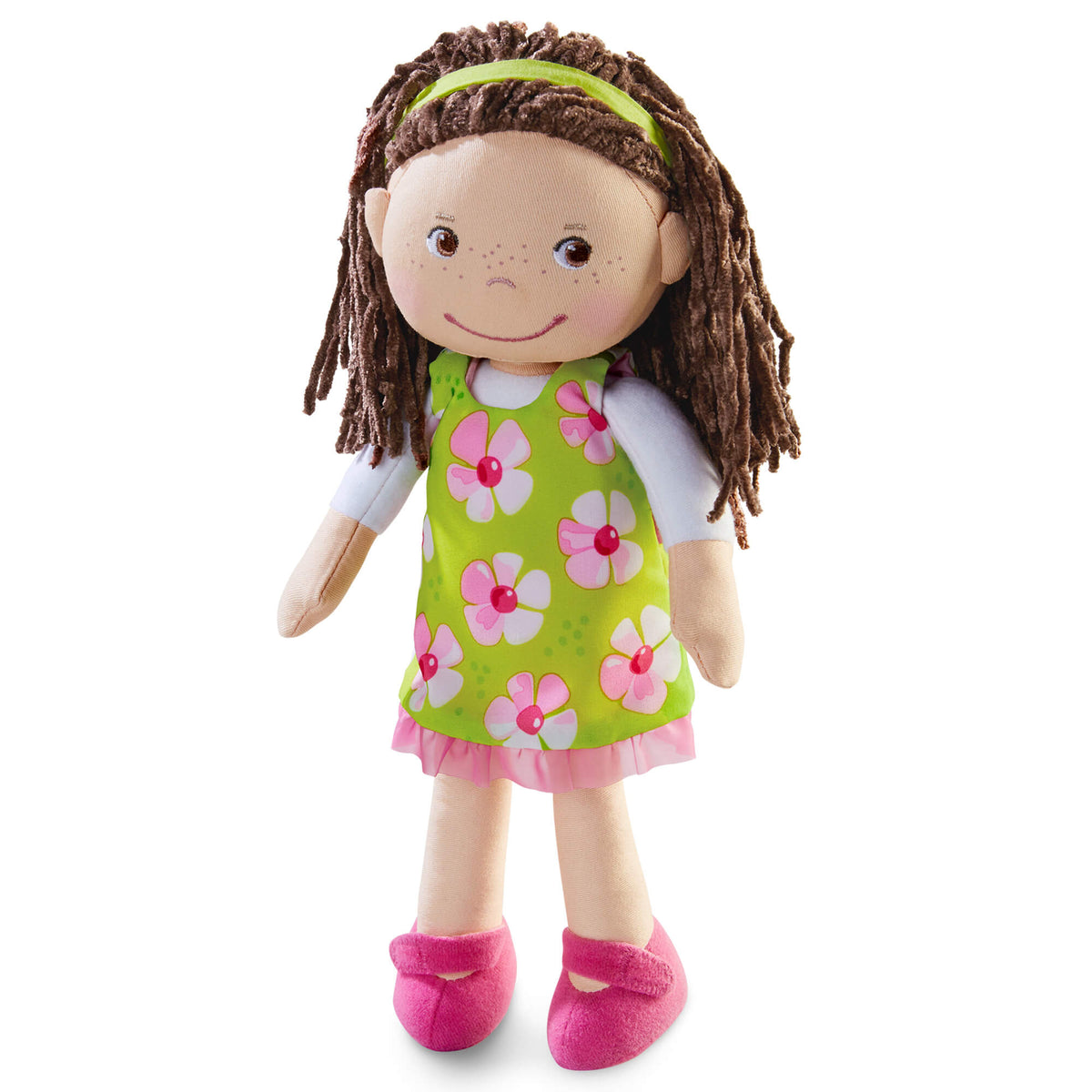 Plush doll with a green dress featuring pink flowers on a white background