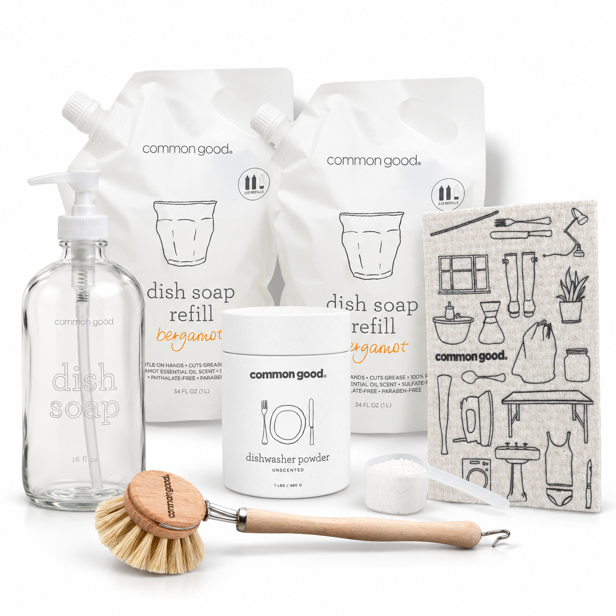Common Good Complete Dishwashing Bundle with glass dish soap bottle, two refill pouches, dish brush, Swedish cloth, and dishwasher powder with scoop